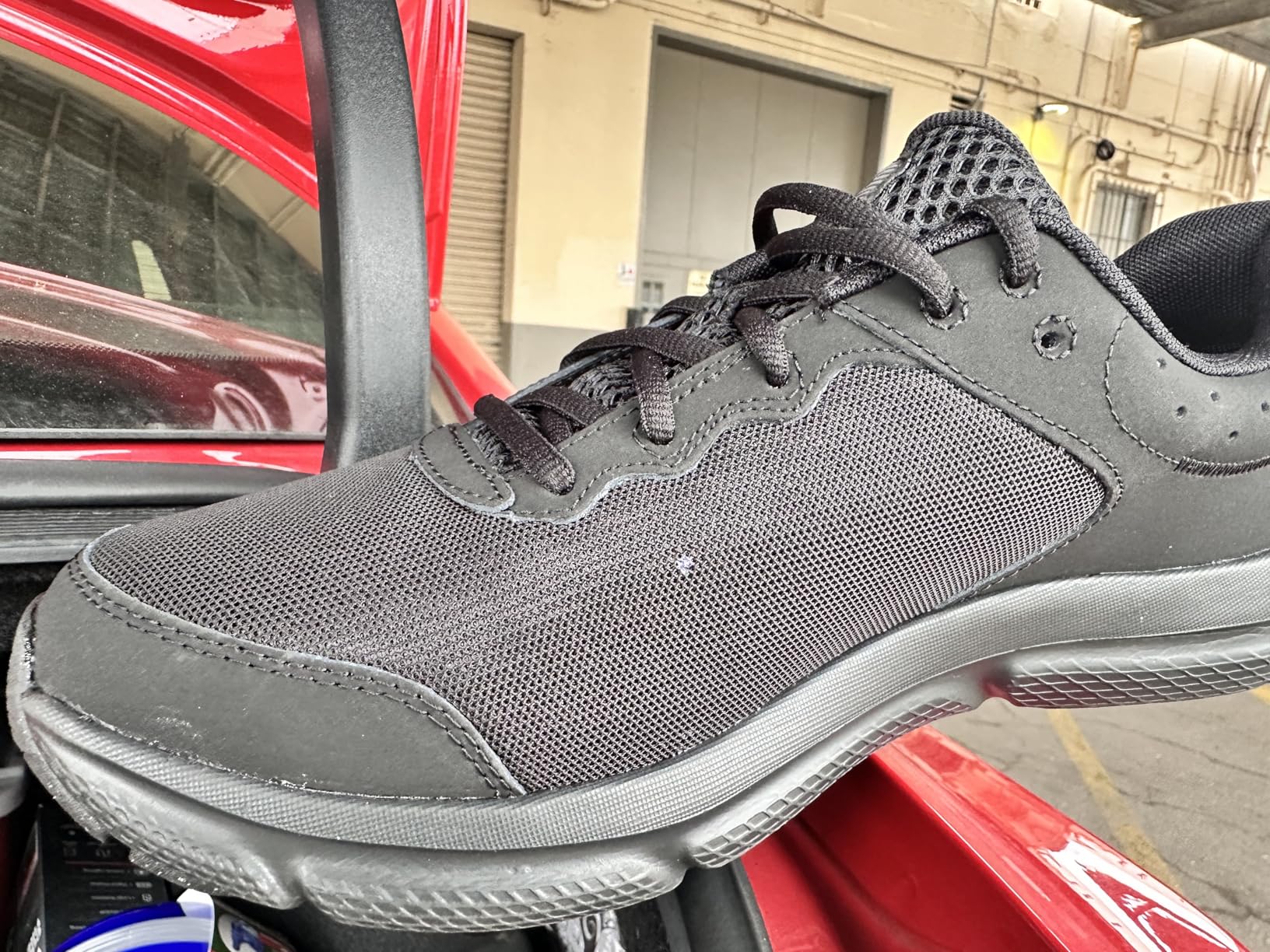 Under Armour Charged Assert 10 showing construction quality detail
