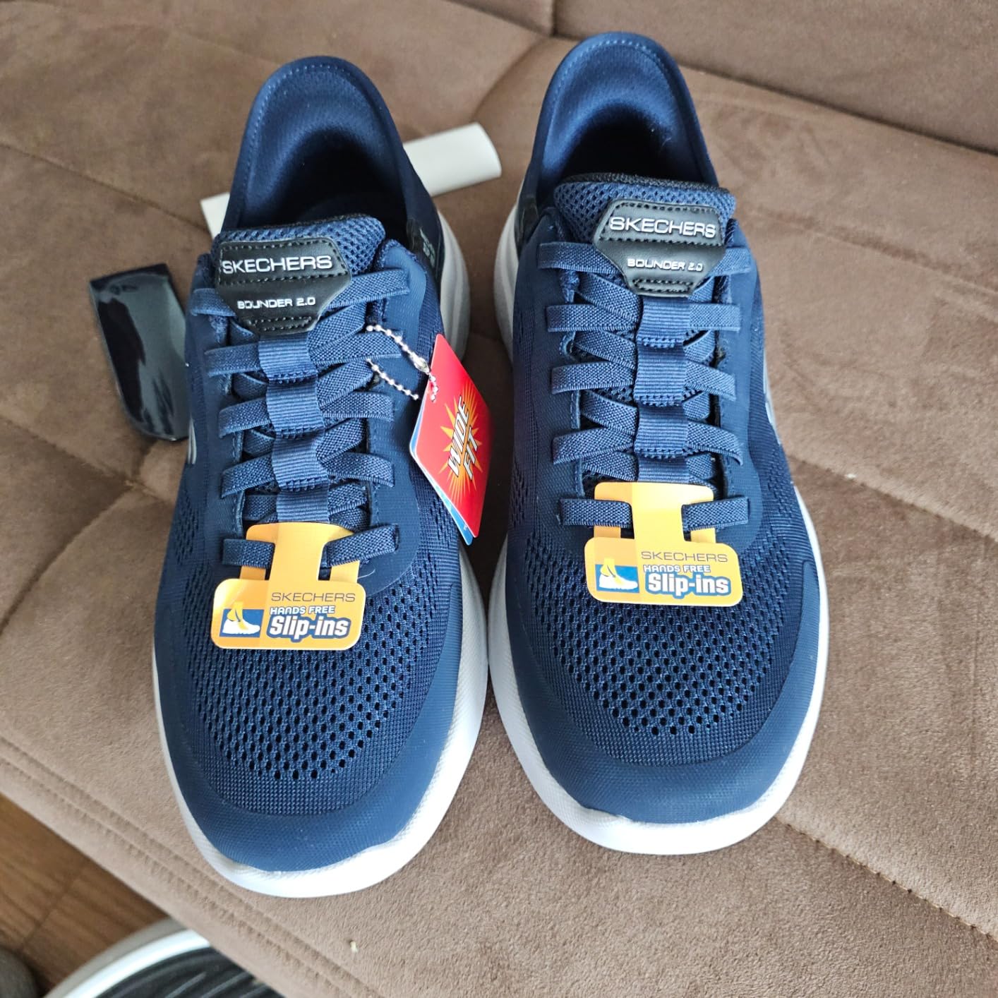 Skechers Bounder 2.0 slip-in sneaker detail showing engineered knit upper and heel pillow design