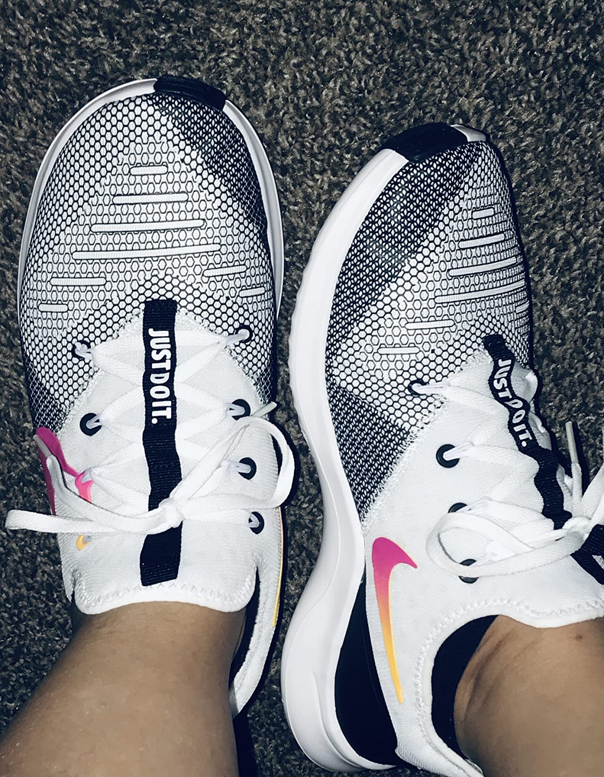 Nike Women's training shoes worn in real-world setting showing practical everyday use