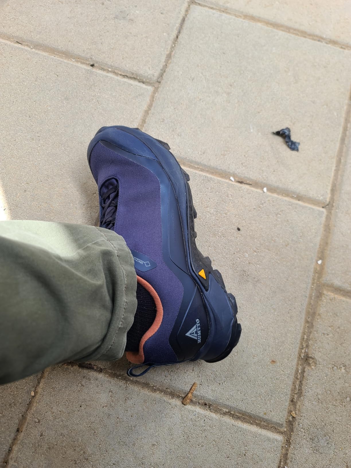 HUMTTO Men's All-Terrain Waterproof Hiking Shoes navy blue colorway showing rugged construction and aggressive tread pattern