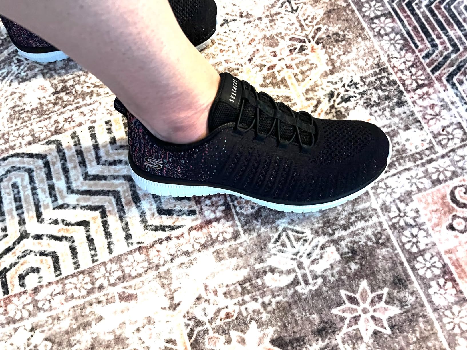 Multiple colorways of Skechers Virtue sneaker showing style options