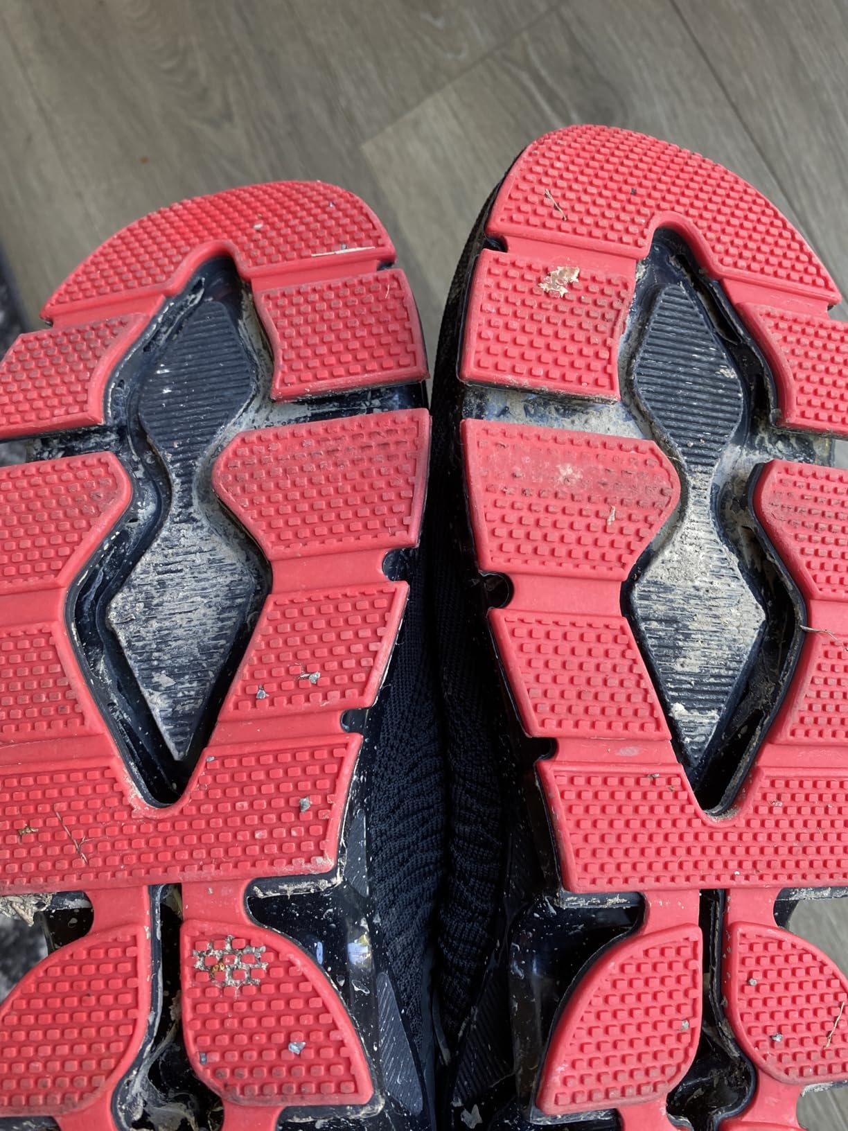 Bottom view showing blade sole pattern and wear patterns after extended use