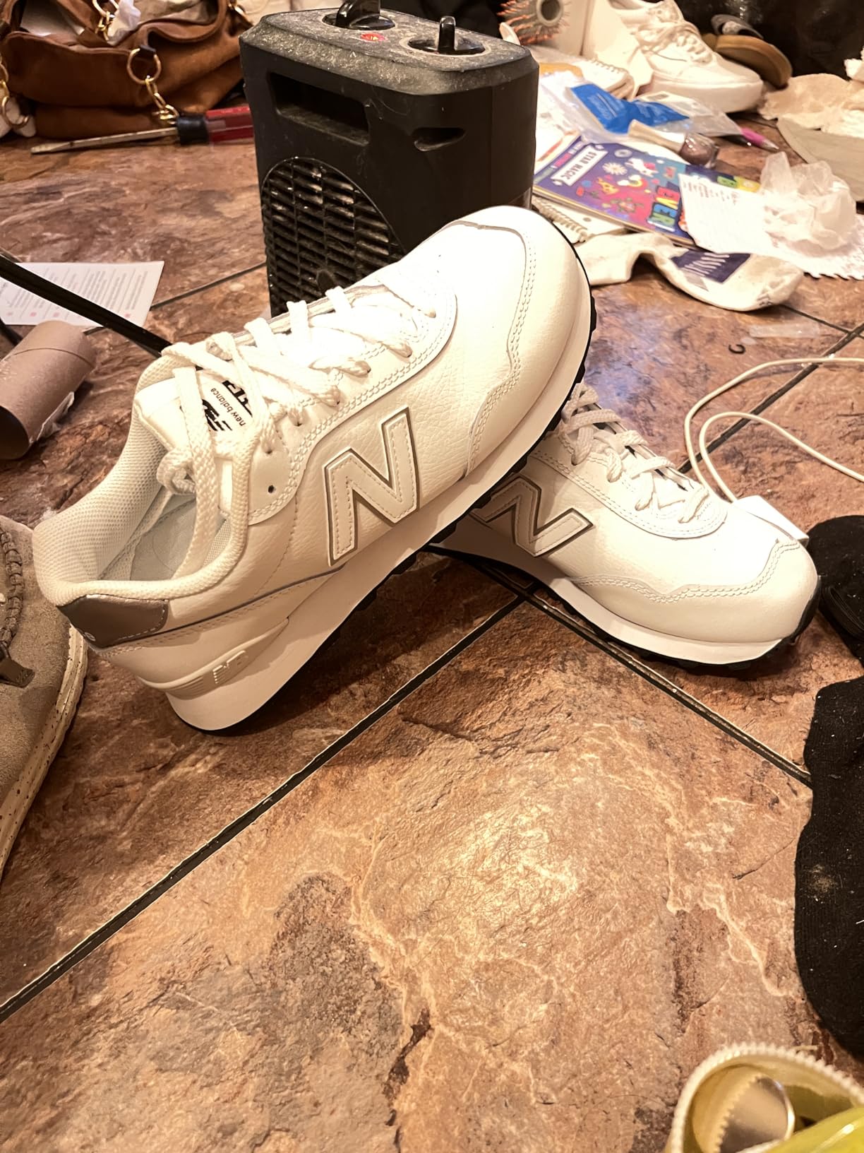 New Balance 515 V3 side profile showing leather upper construction and classic N logo design