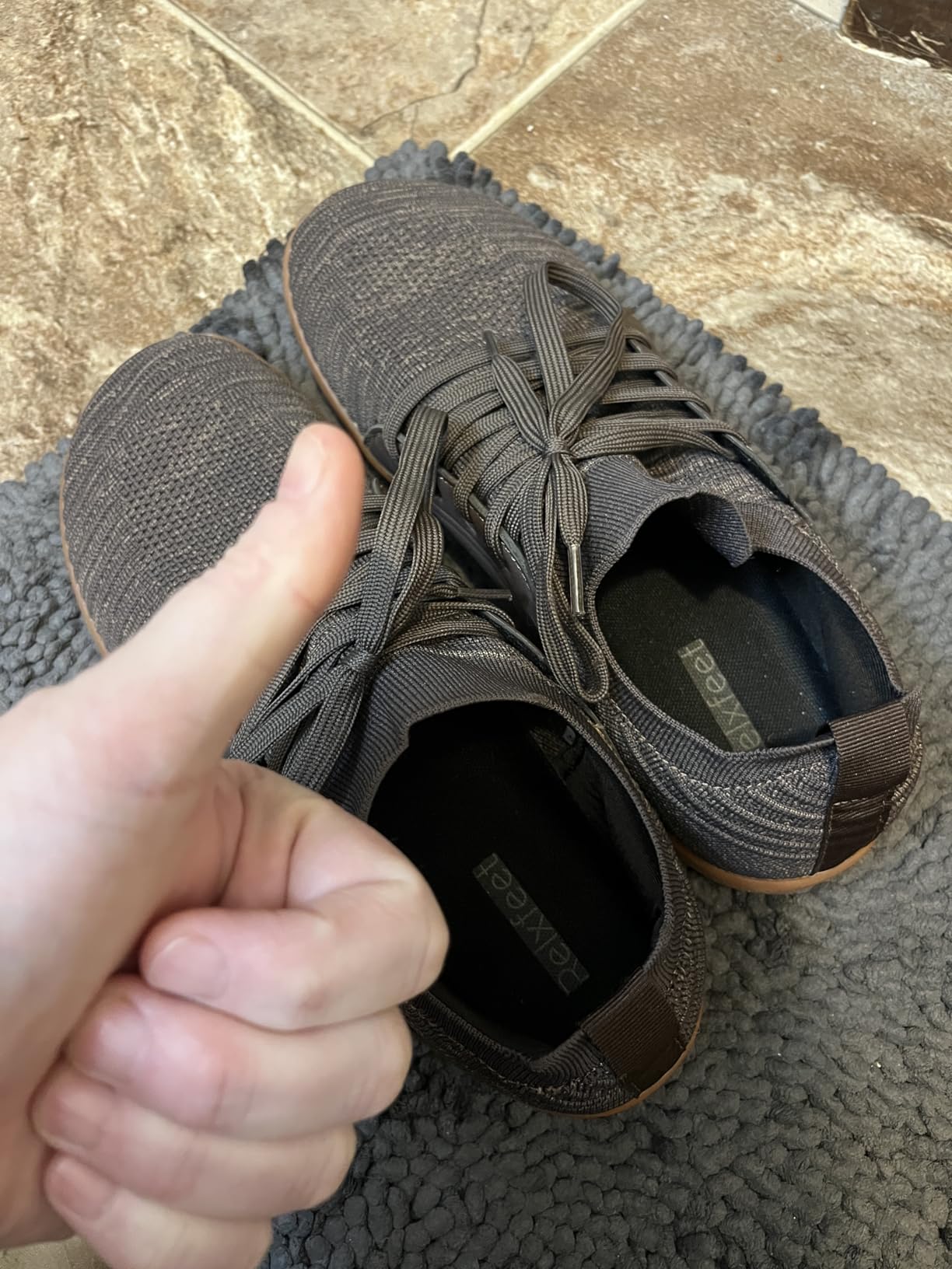 Relxfeet barefoot shoes being tested in gym environment showing flexibility and ground contact