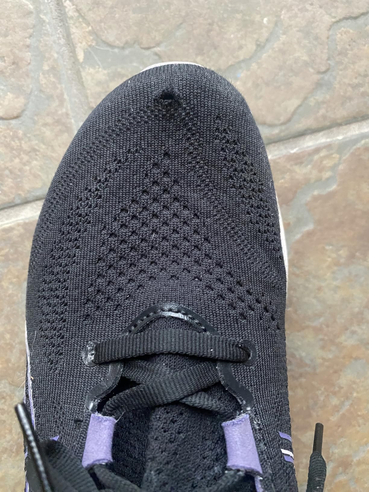 ASICS Gel-Nimbus 26 showing durability issues with holes in upper mesh after extended wear