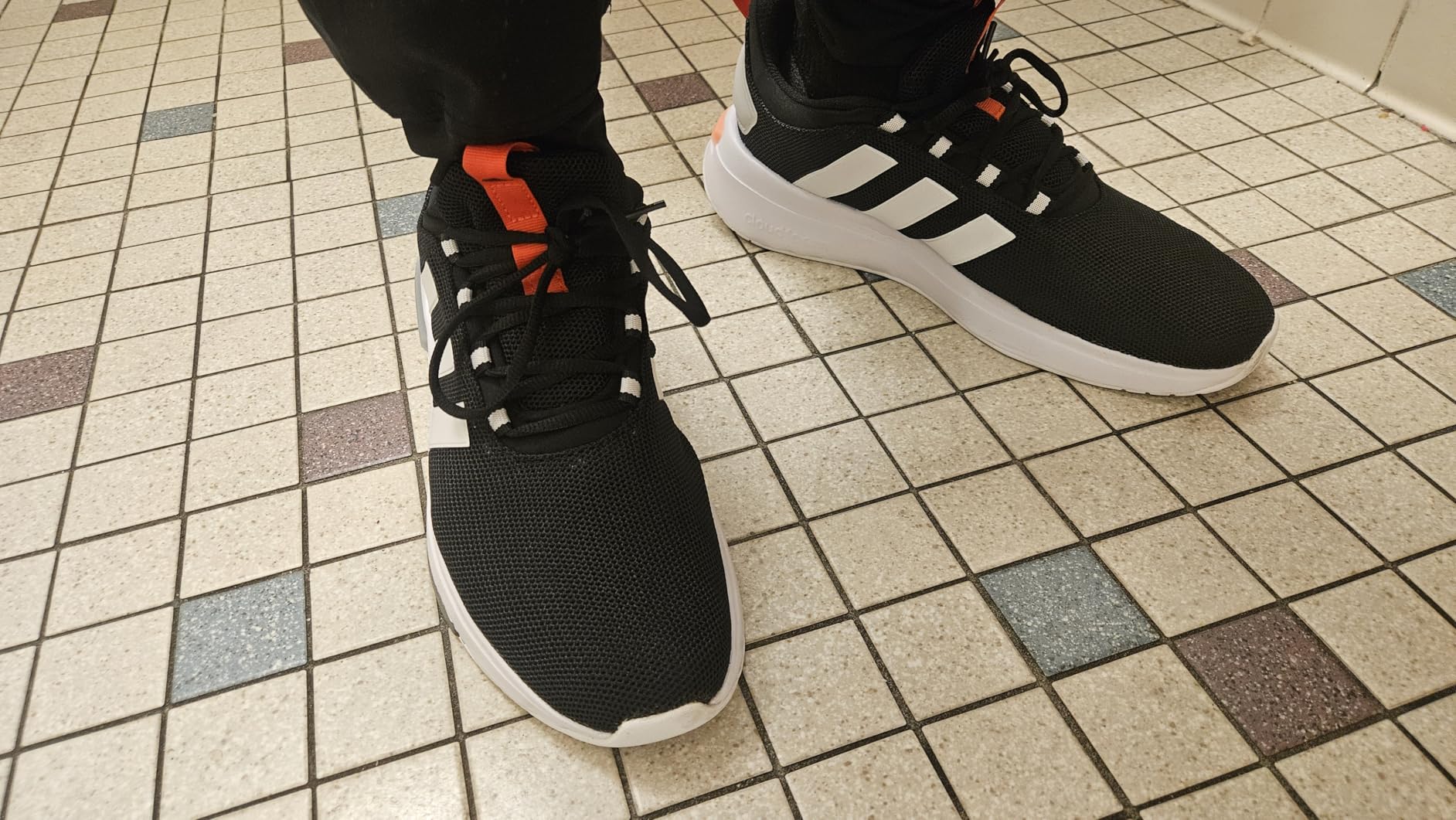 Bottom view of Adidas Racer TR23 showing synthetic rubber outsole tread pattern and construction