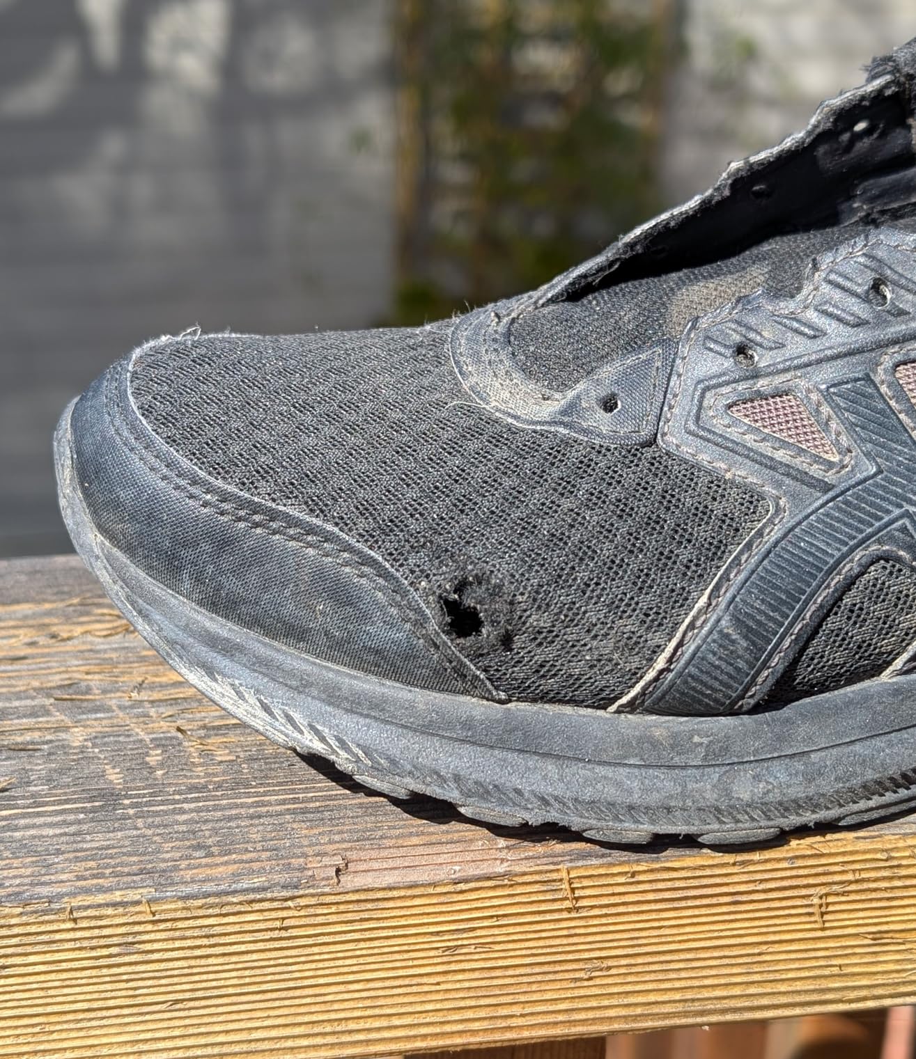 ASICS Gel-Contend 9 showing mesh upper durability concern at toe flex point
