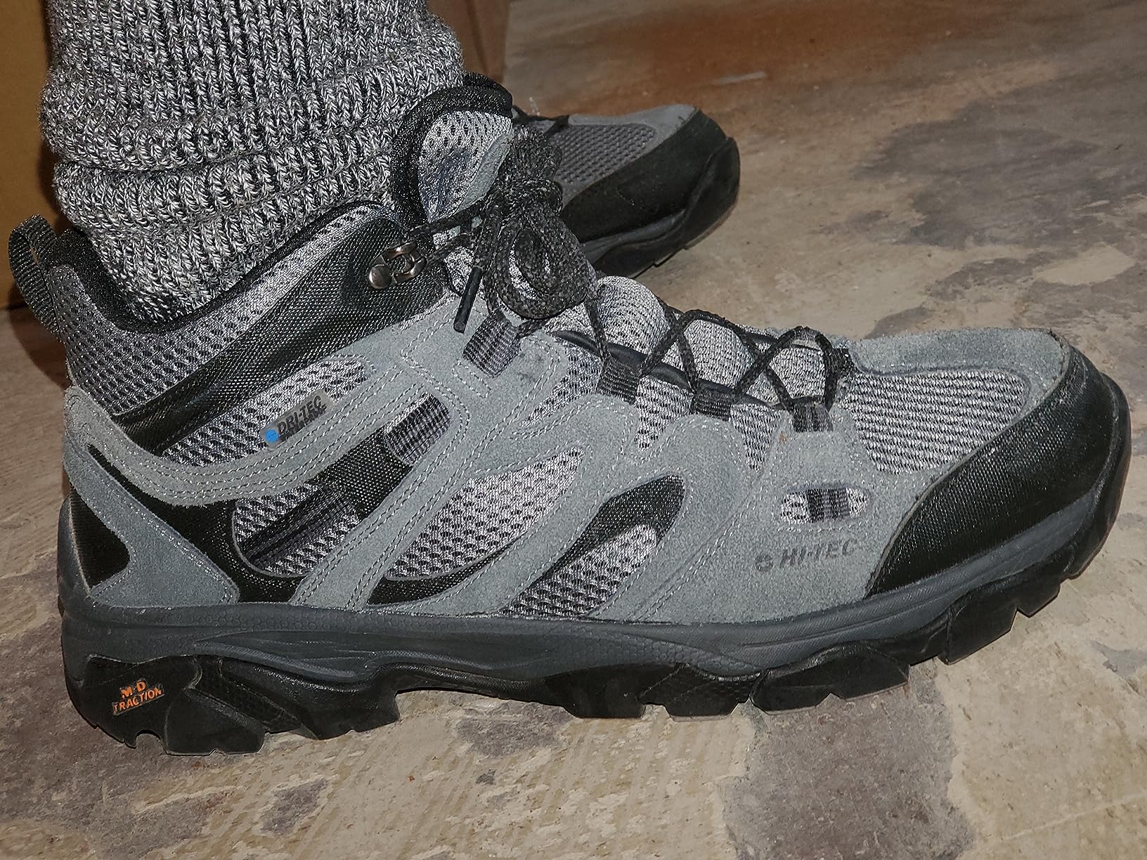 Side profile view of HI-TEC Ravus WP showing ankle support and overall boot silhouette