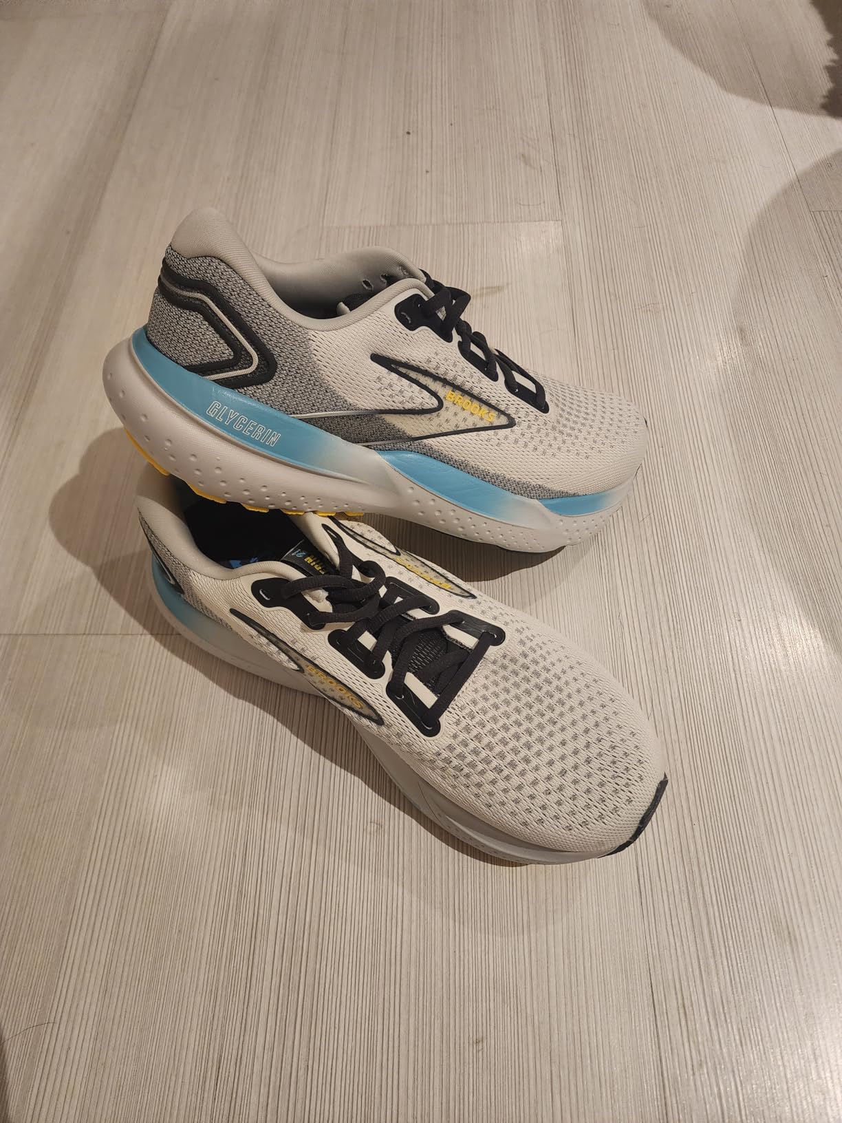 Brooks Glycerin 21 in action during road running showing heel strike and toe-off phases