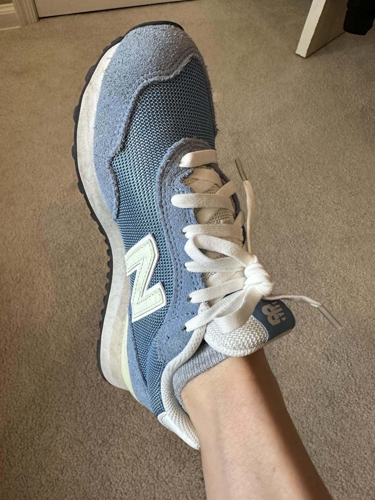 New Balance 515 V3 in navy blue colorway showing versatile styling and color options