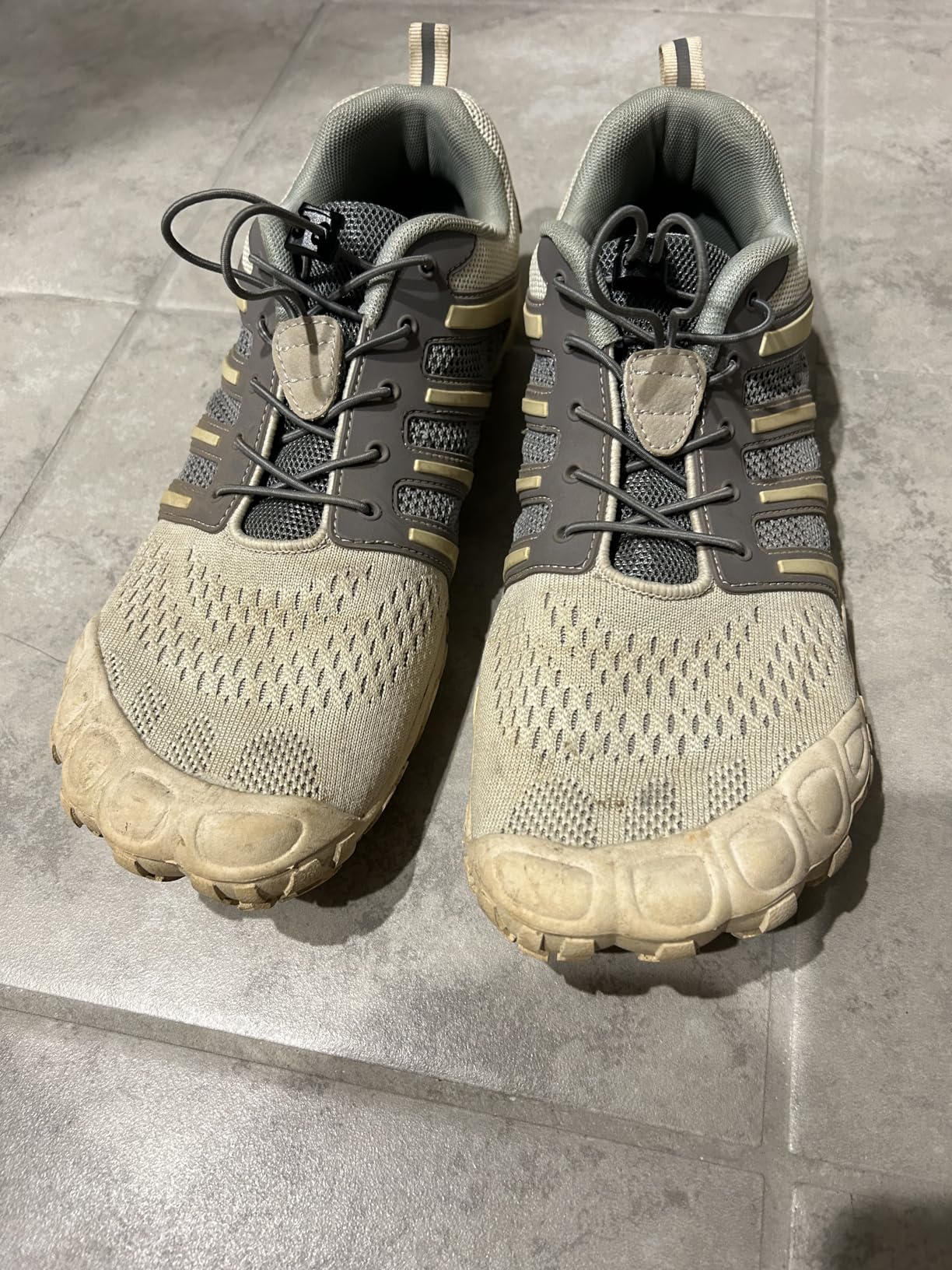Close-up view of wide toe box design showing individual toe outlines and zero-drop sole construction