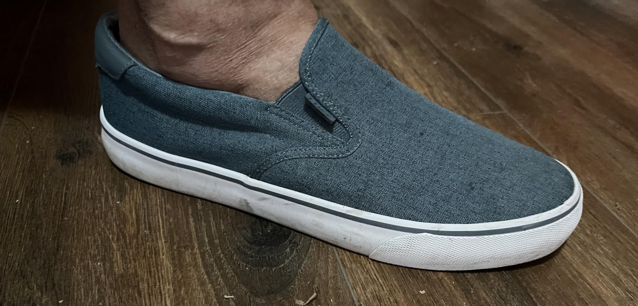 Close-up of Lugz Clipper showing canvas texture and toe cap construction details