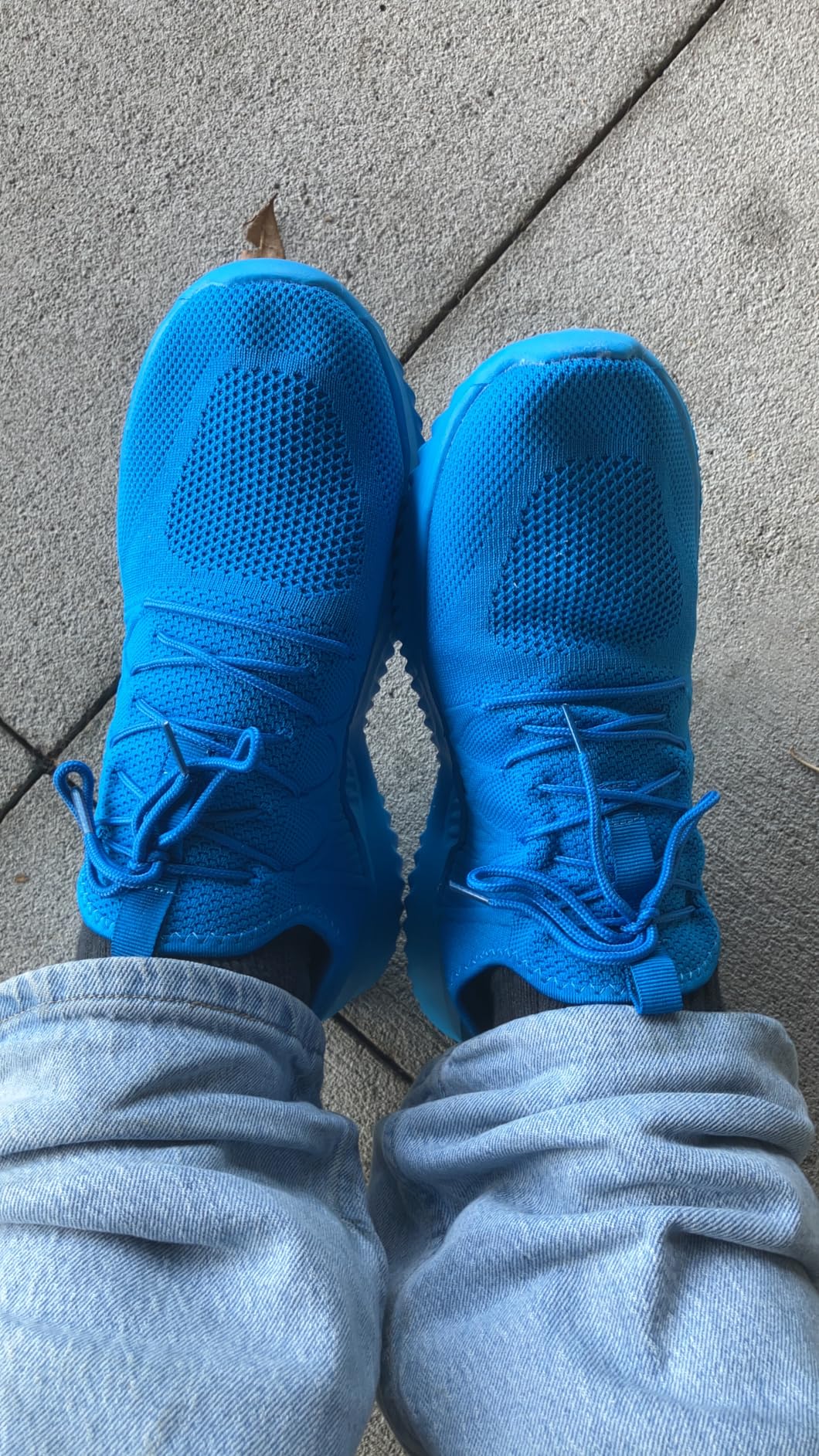 Close up view of mesh knit upper construction showing breathable design and lace pattern