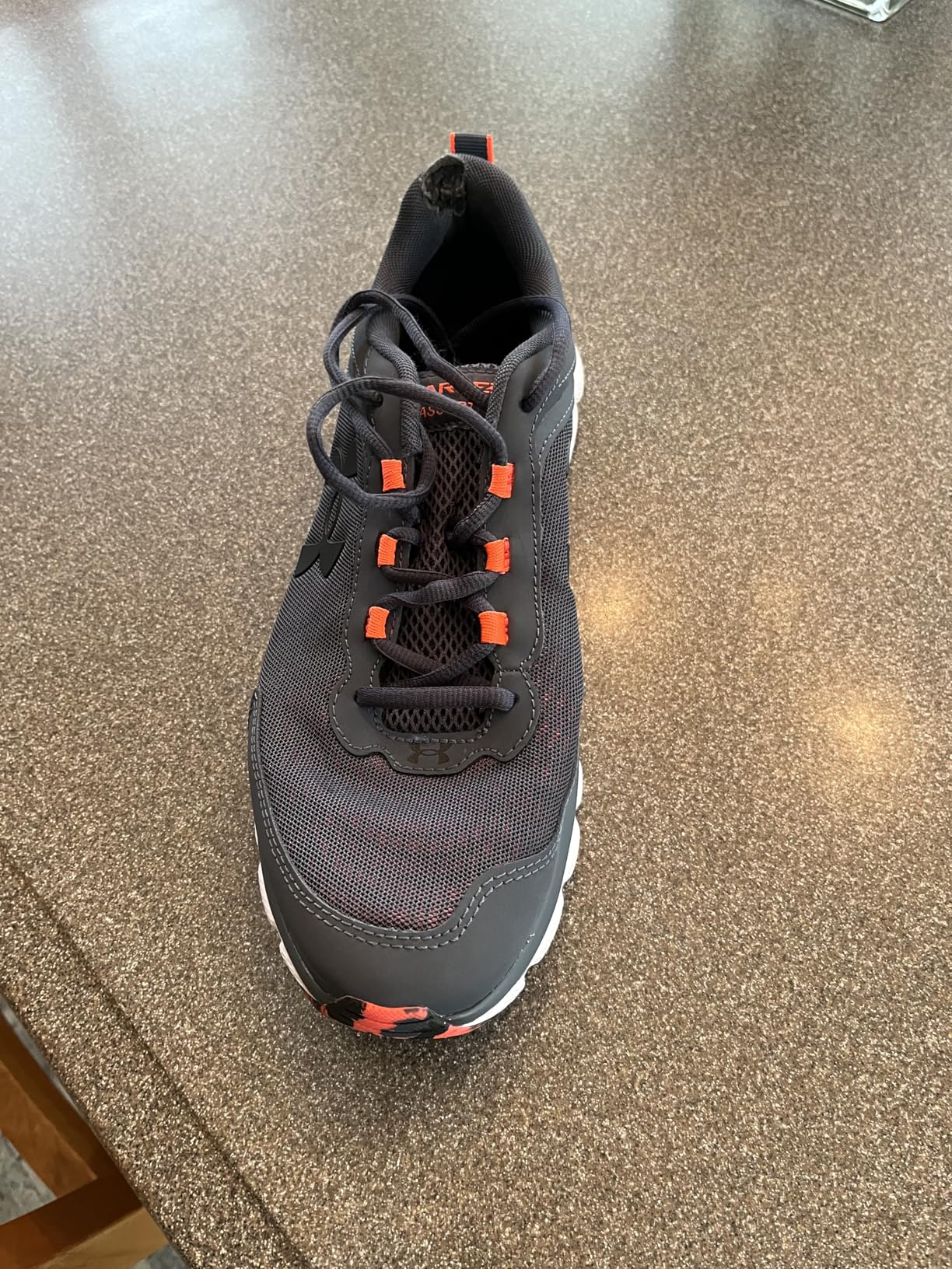 Under Armour Charged Assert 9 comparison showing marketing claims versus real-world performance results