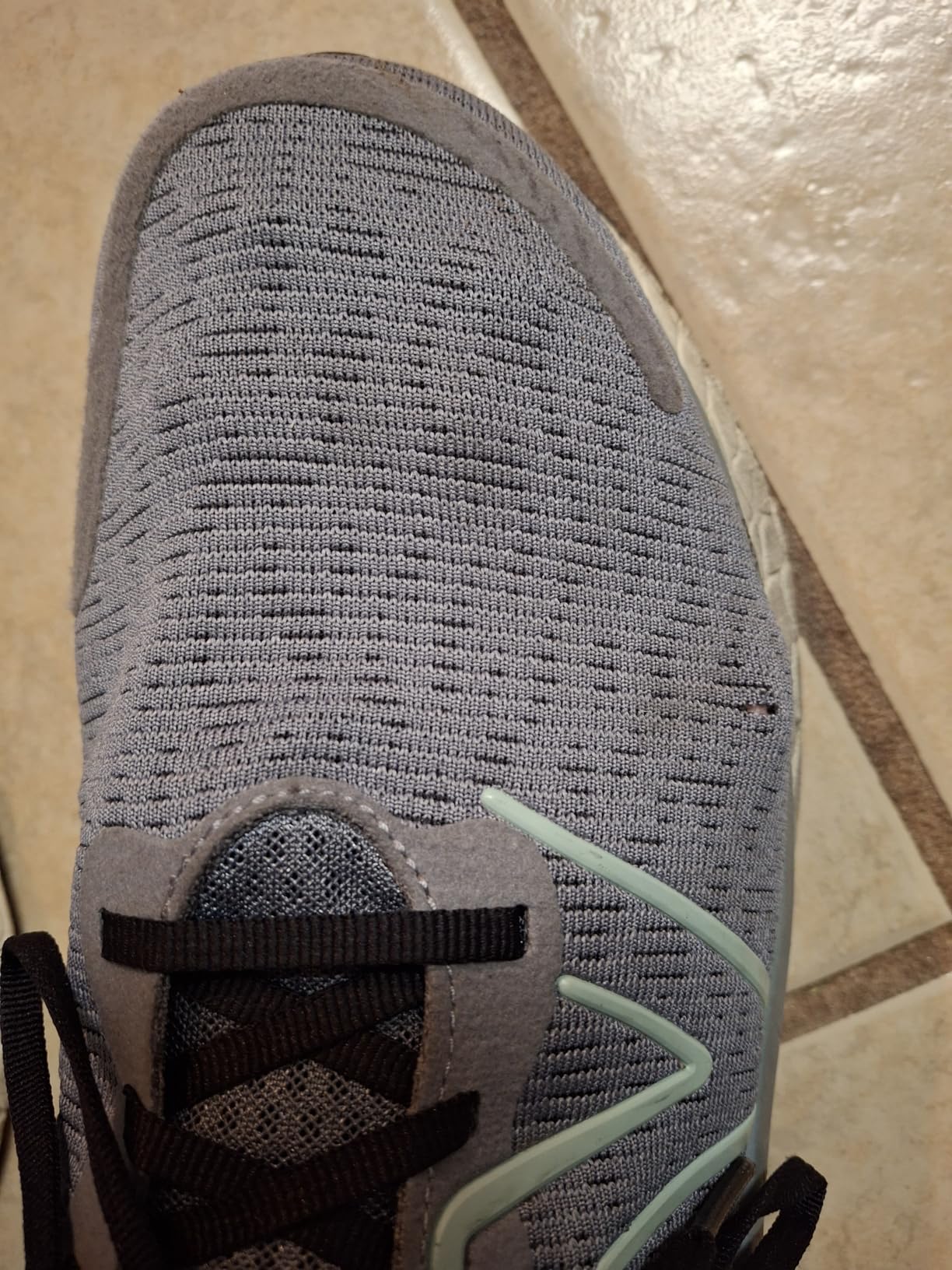 New Balance Kaiha rear view showing heel construction and cushioning system