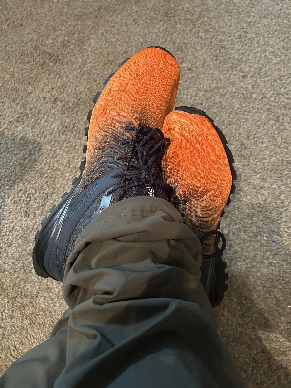 Action shot of Kricely walking shoes during outdoor testing showing durability and performance