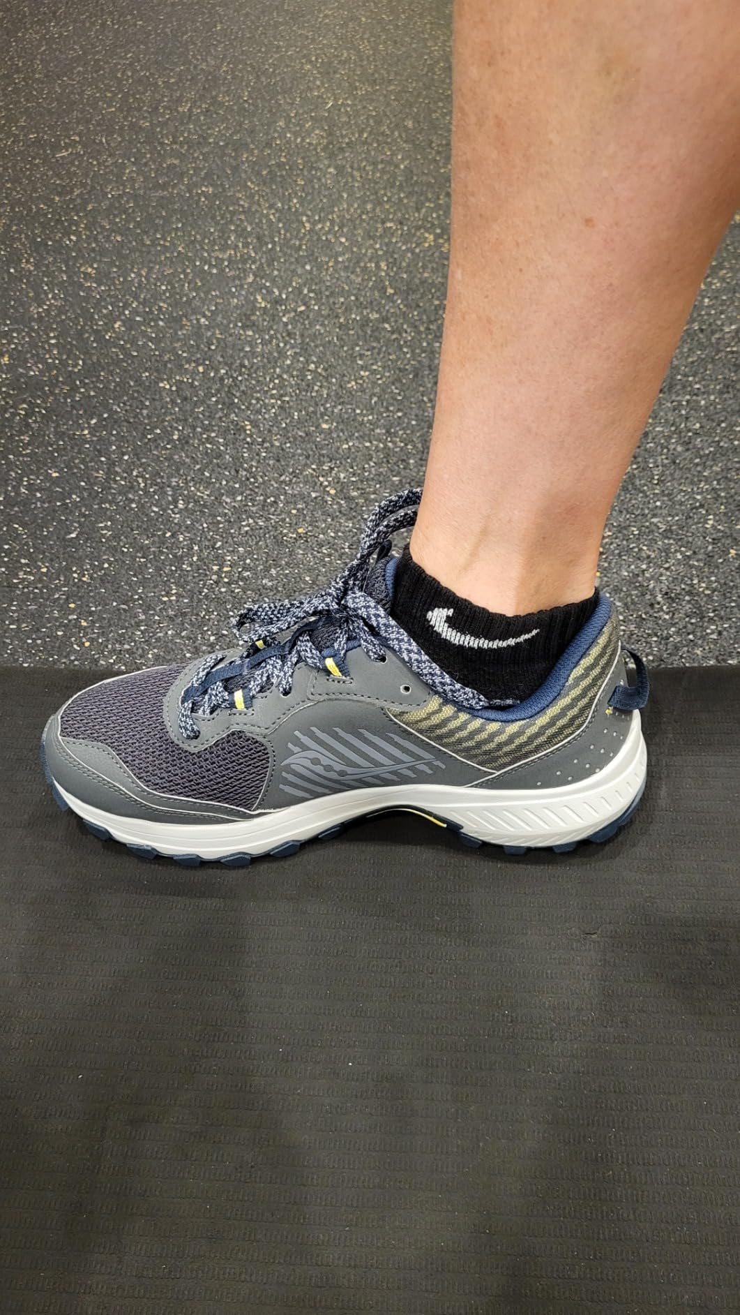 Saucony Excursion TR15 outsole showing aggressive tread pattern and carbon rubber construction for trail traction