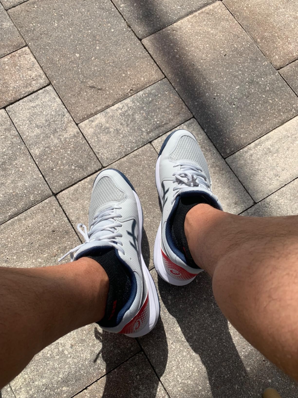 ASICS Gel-Dedicate 8 action shot during tennis match gameplay