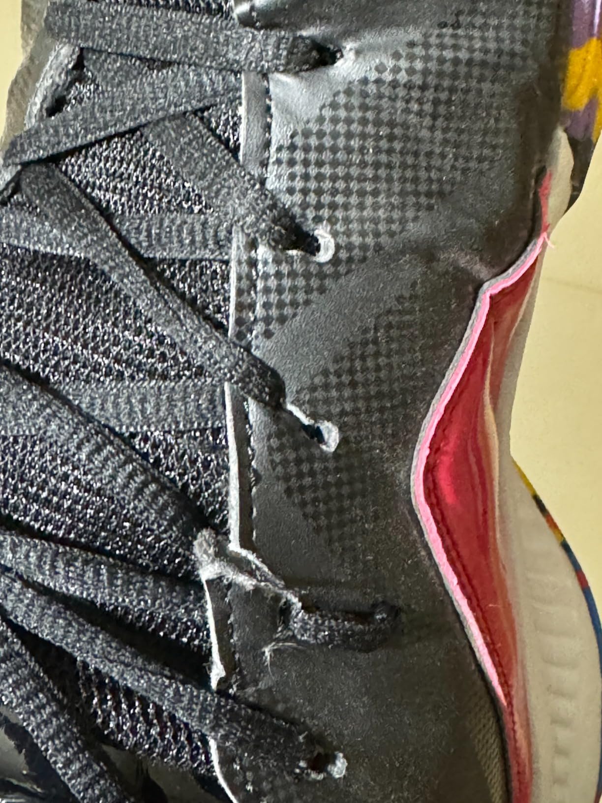 ASHION basketball shoes being tested on outdoor court showing wear patterns and performance