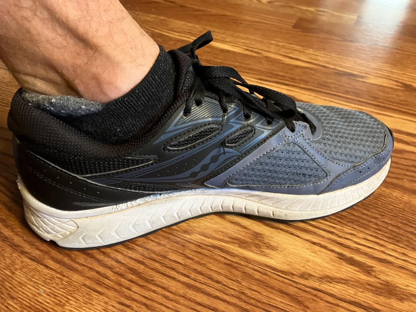 Bottom view of Saucony Cohesion 13 showing rubber outsole tread pattern