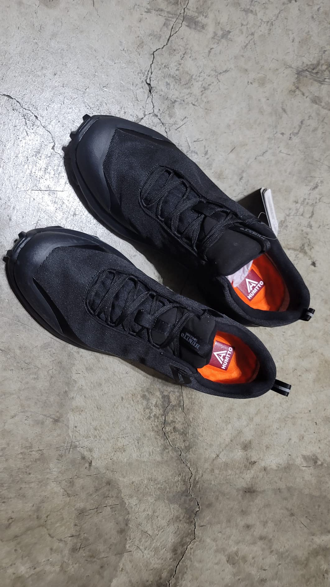 HUMTTO shoe outsole showing aggressive lug pattern and EVA midsole cushioning