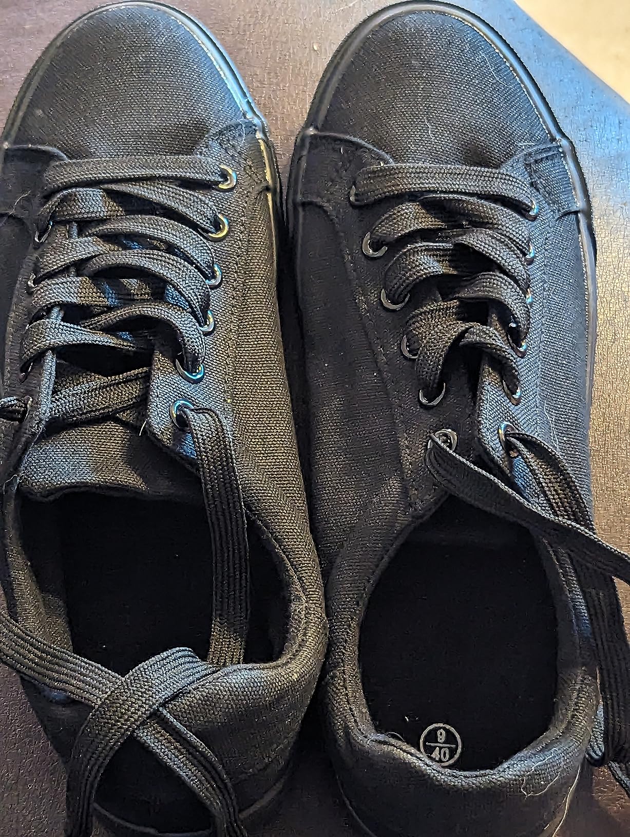 Close-up detail of Witwatia canvas sneakers showing breathable fabric and construction quality