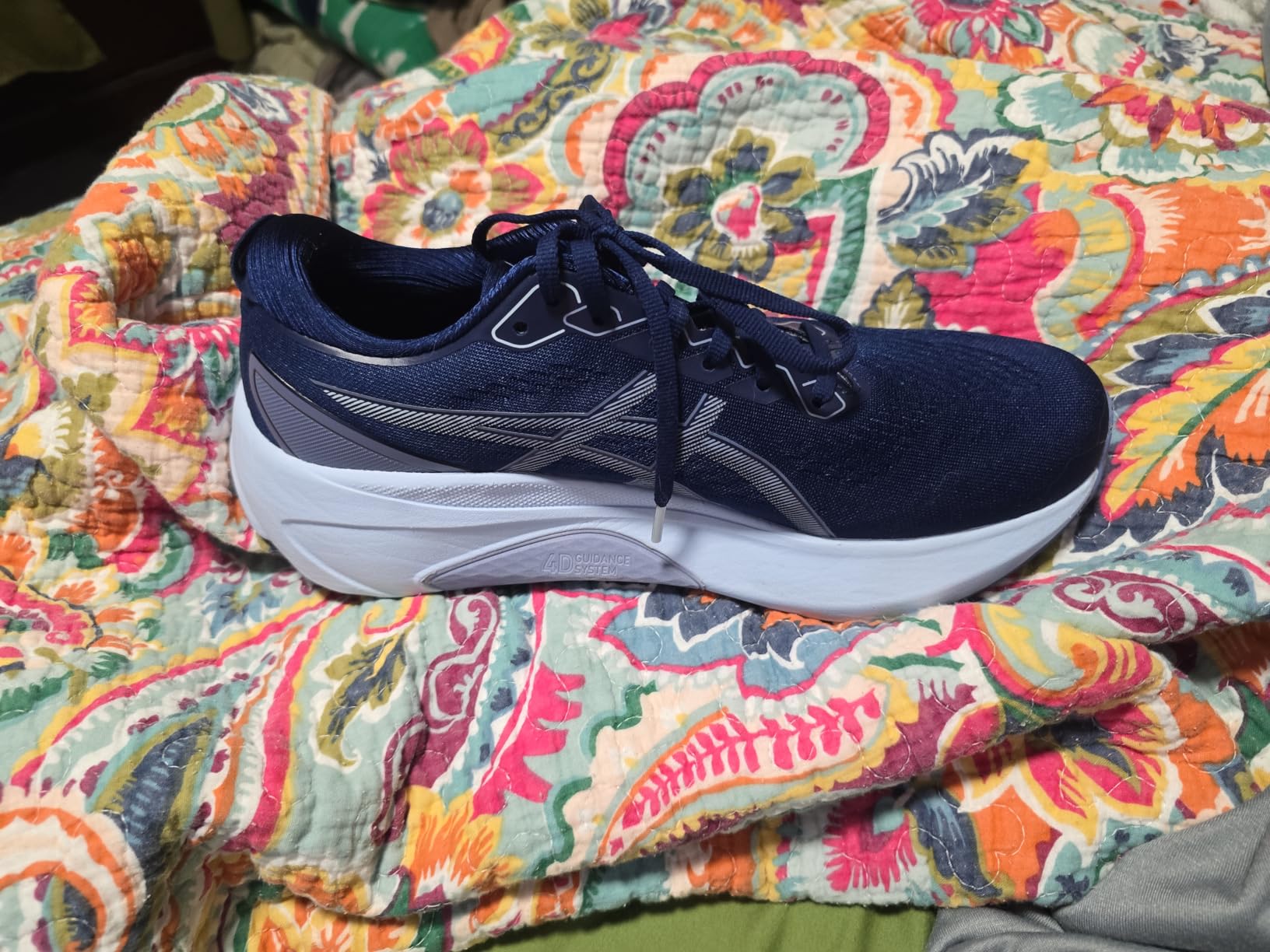 Full side view of ASICS Gel-Kayano 30 showing complete shoe profile and design elements