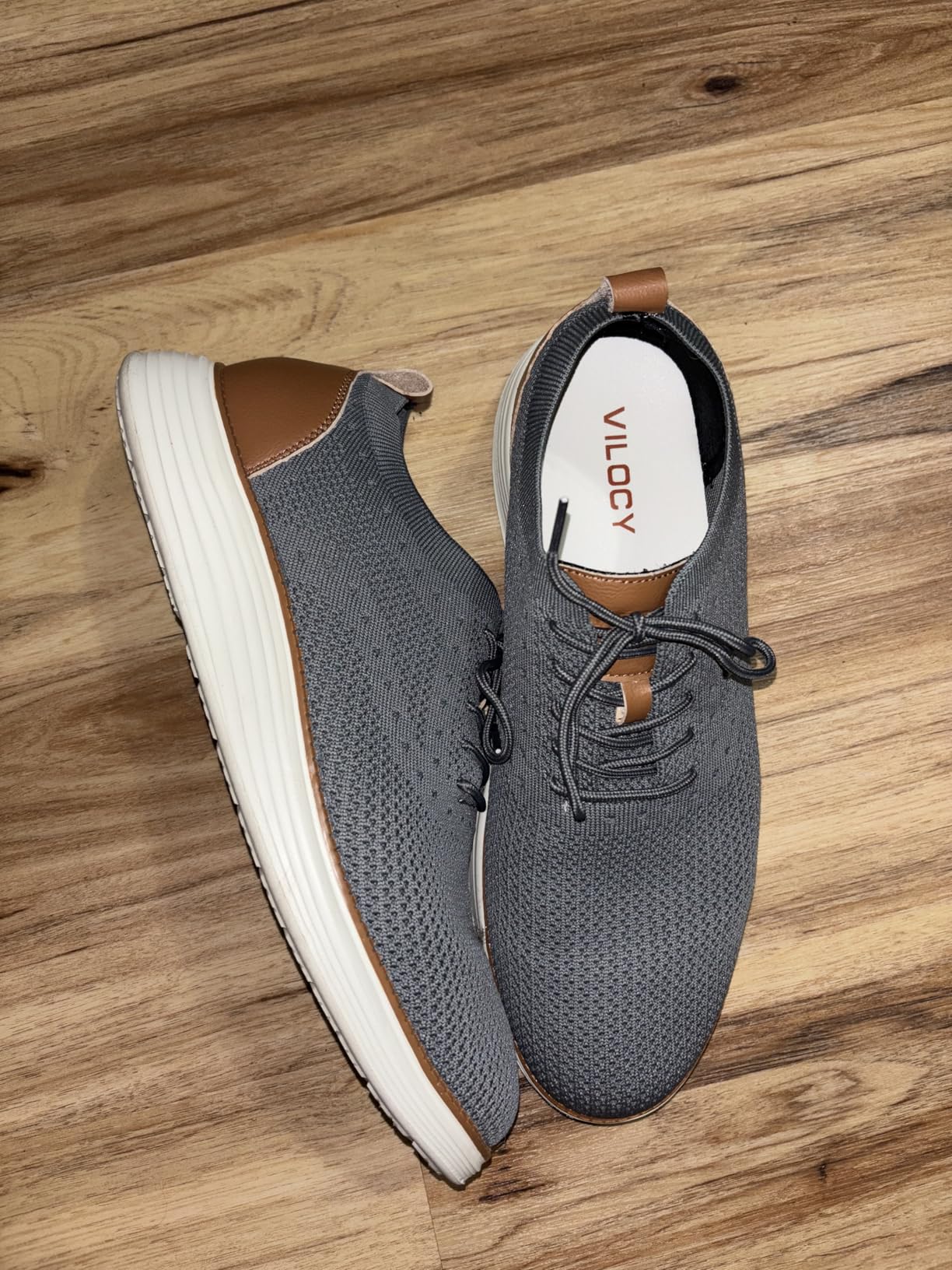 VILOCY dress sneakers worn with business casual attire showing versatile styling capabilities