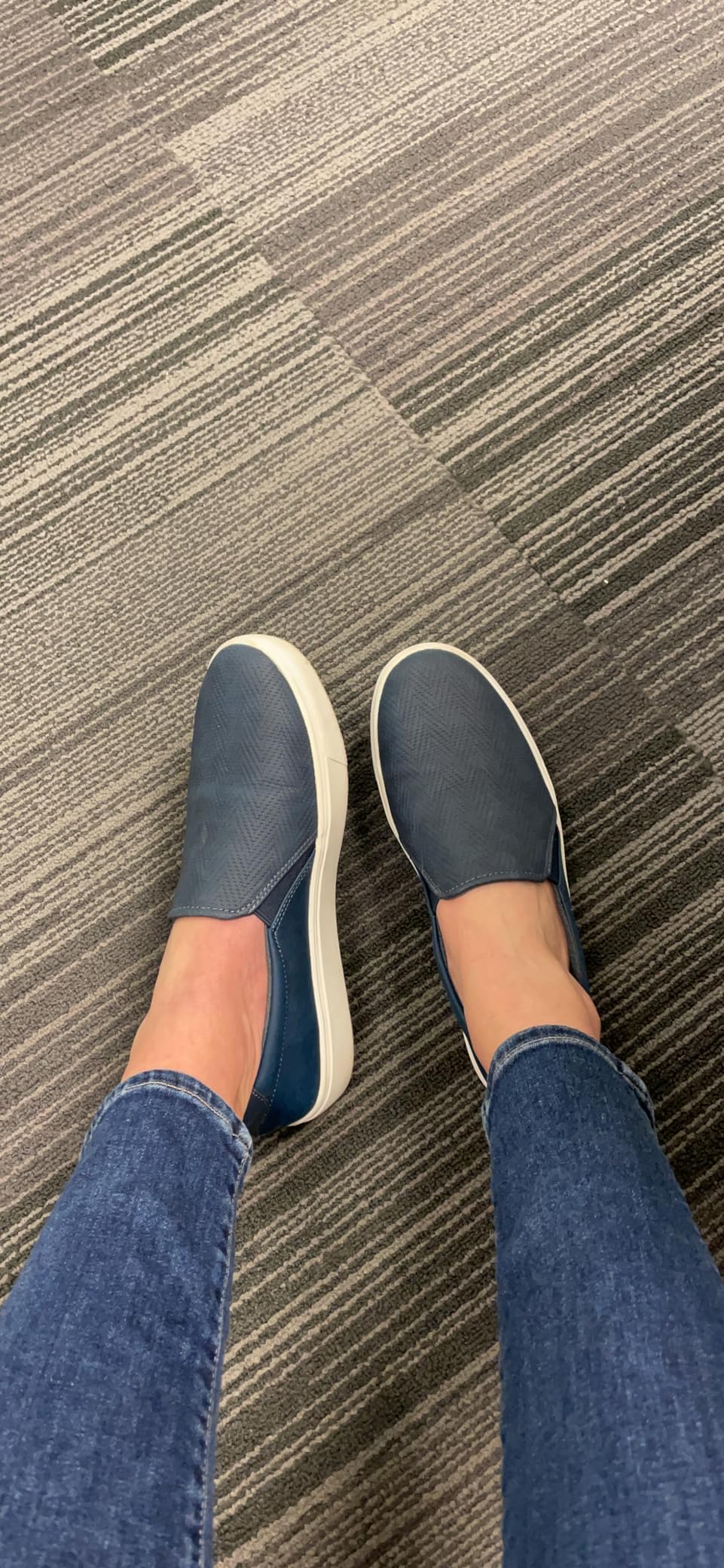 Dr. Scholl's Nova worn with jeans showing versatile styling and comfortable slip-on design