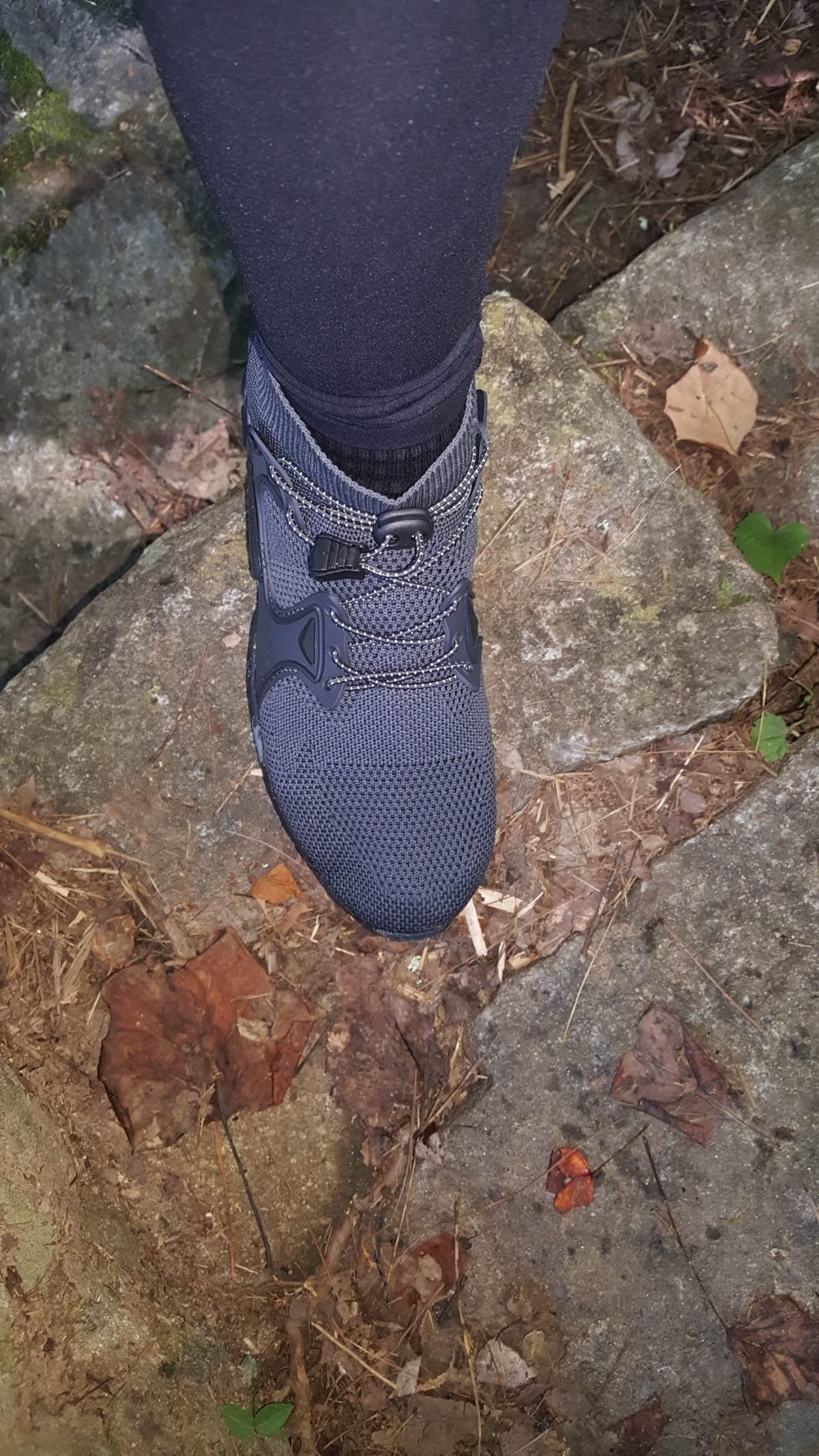 Action shot of hiking shoes in natural outdoor environment