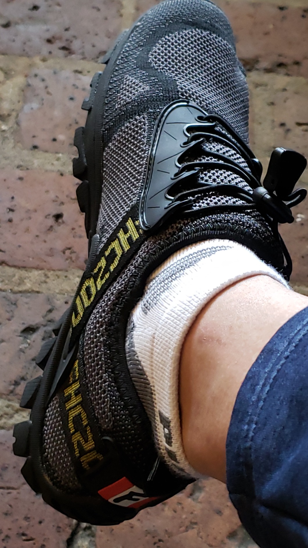 ABAO hiking shoes detail view showing knitted mesh breathable upper construction and lacing system
