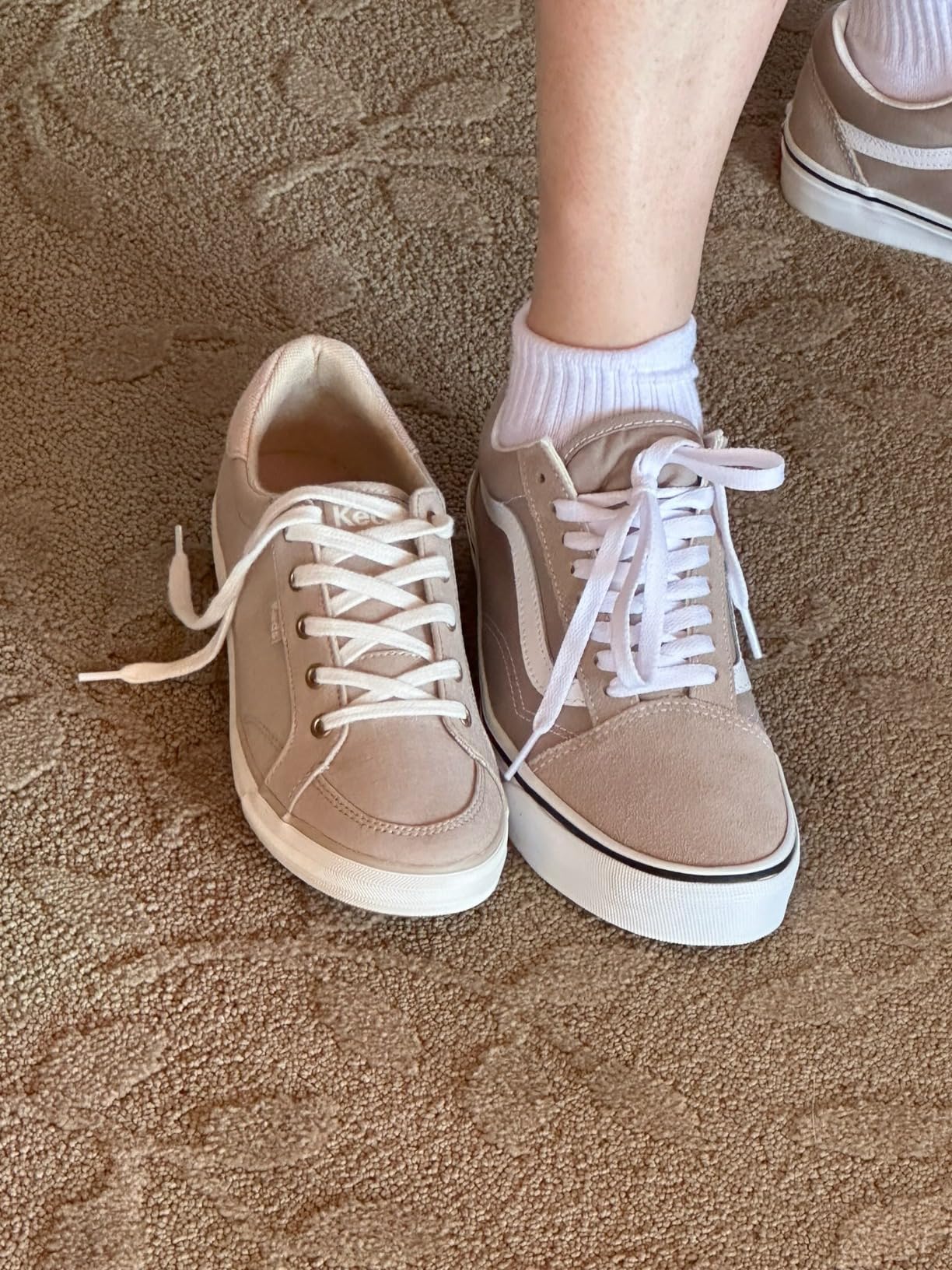 Customer comparison photo showing Keds sizing versus other brand sneakers