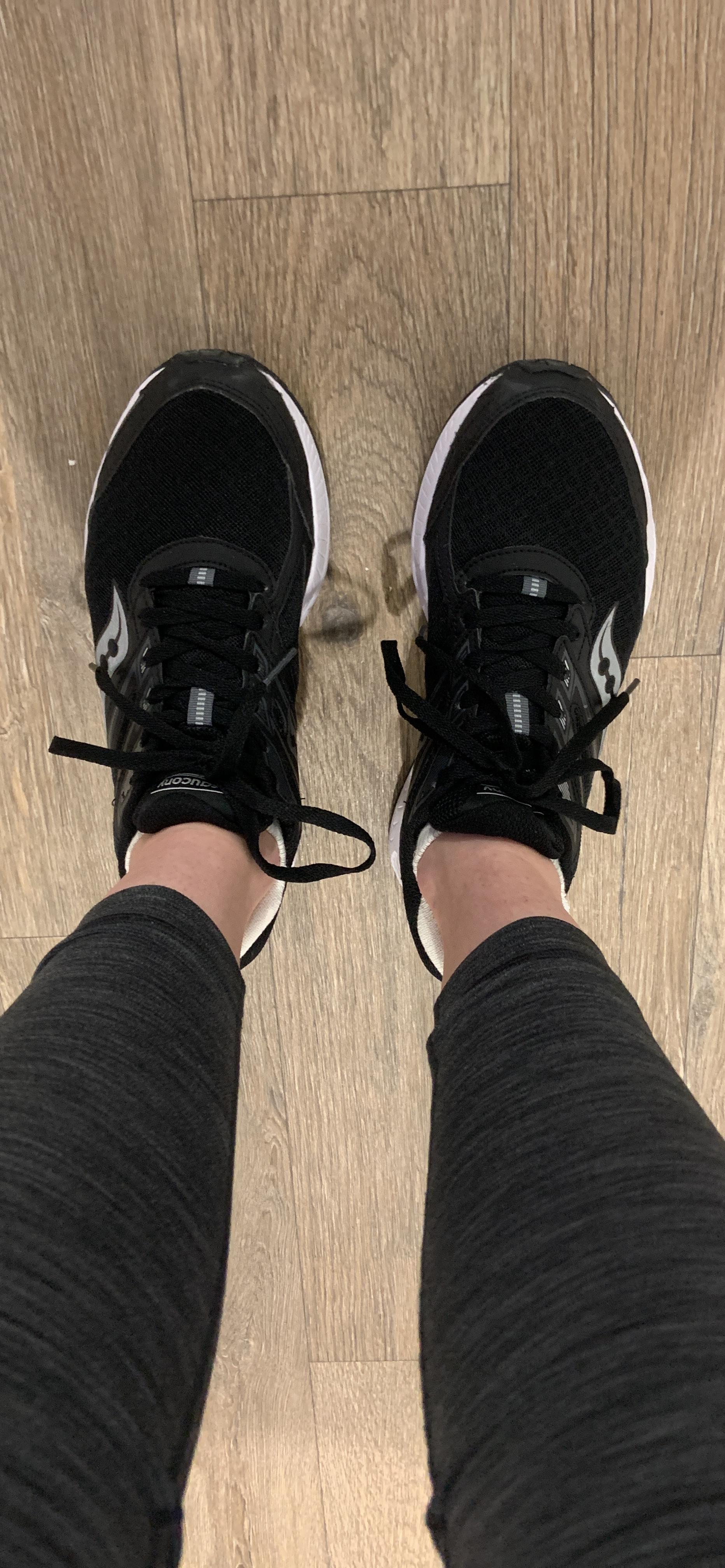 Bottom view of Saucony Cohesion 13 showing segmented rubber outsole pattern and traction design