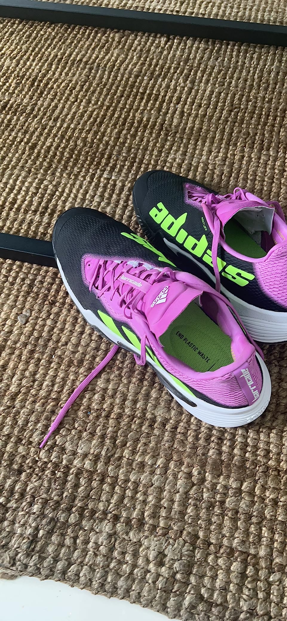 Adidas Barricade in magenta colorway showing unique design aesthetic