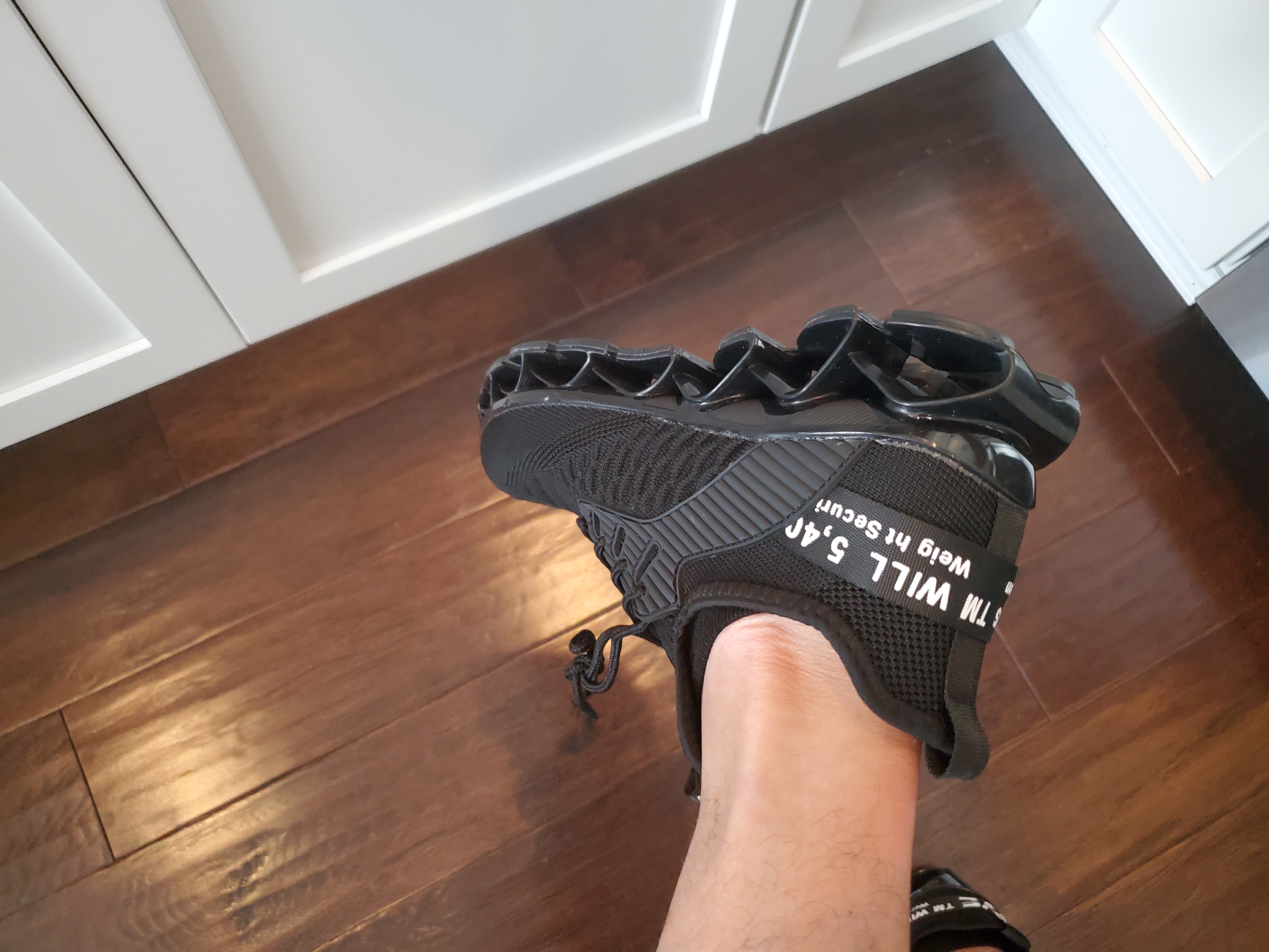 Men's Running Shoes showing sole design and tread pattern for walking performance