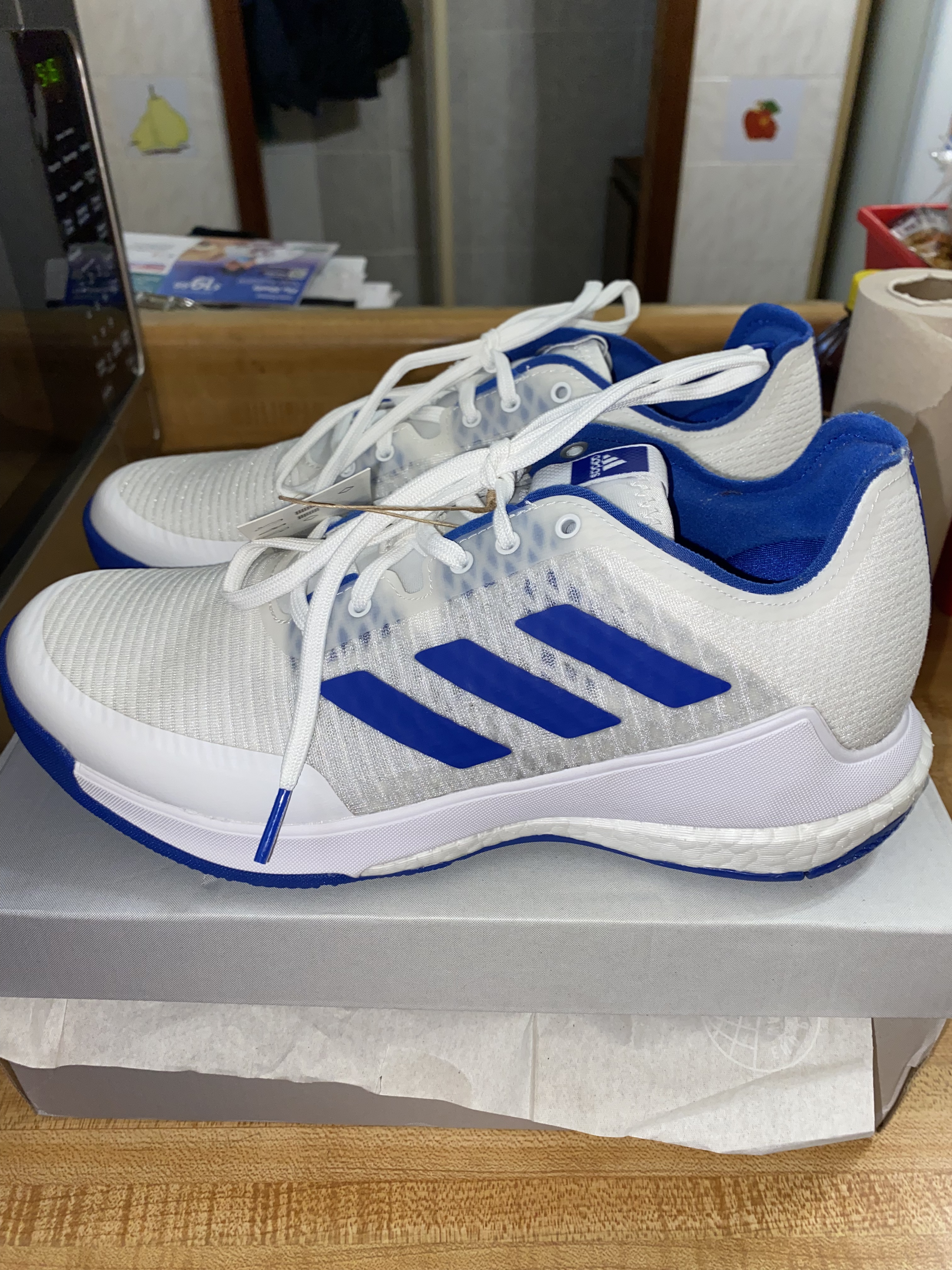 Adidas Crazyflight volleyball shoes action shot showing lateral movement and court performance