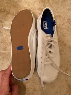 Close-up of Keds Kickstart sneaker showing detailed lace-up construction and material quality