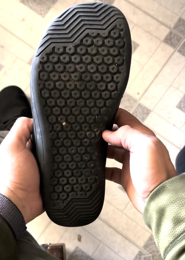Close-up of WHITIN sneaker lacing system and ankle collar padding