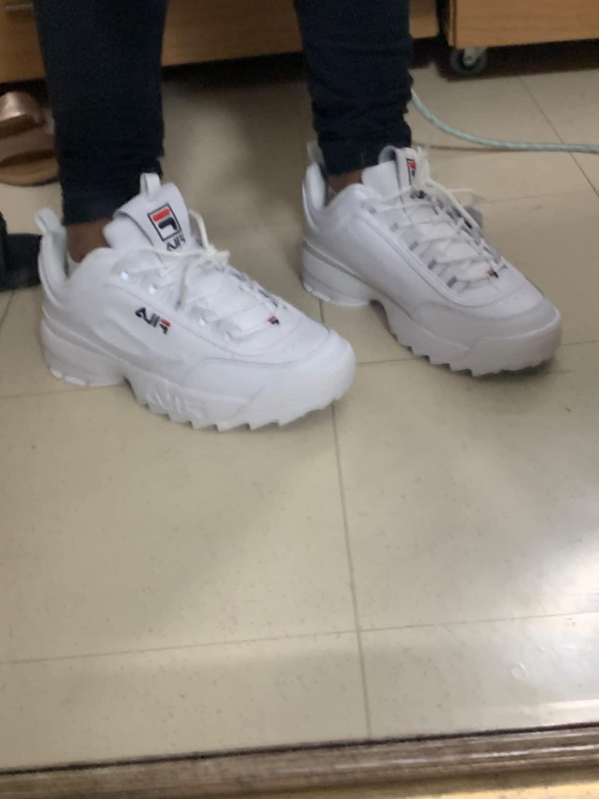 Final assessment shot of Fila Disruptor II showing overall design and build quality