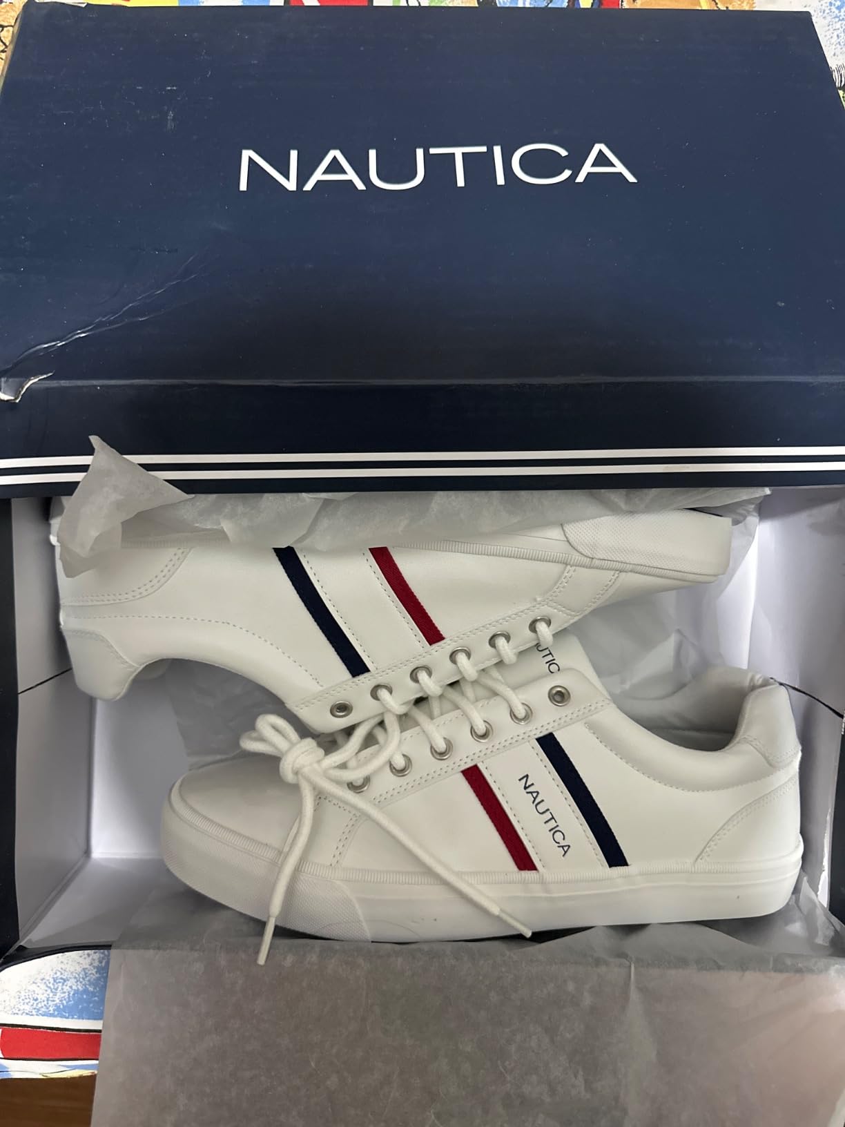 Bottom view of Nautica shoe showing rubber outsole tread pattern and suede accent details