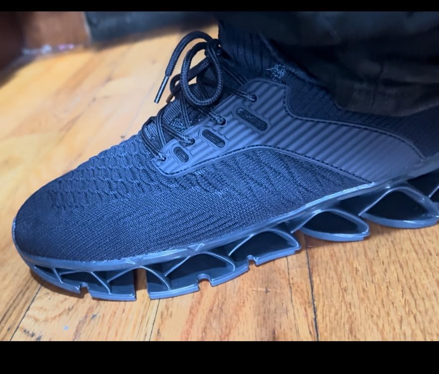 Final product shot of men's blade slip-on shoes showing overall design and value proposition