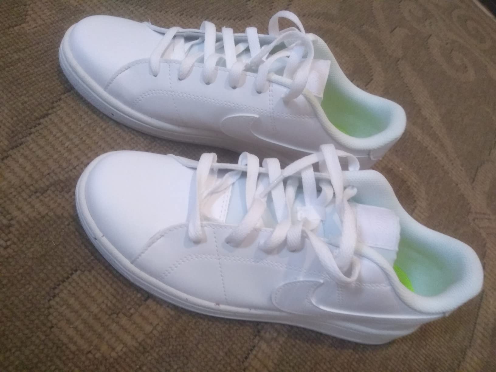 Nike Men's Tennis Shoe on court during testing showing performance during lateral movements and court play