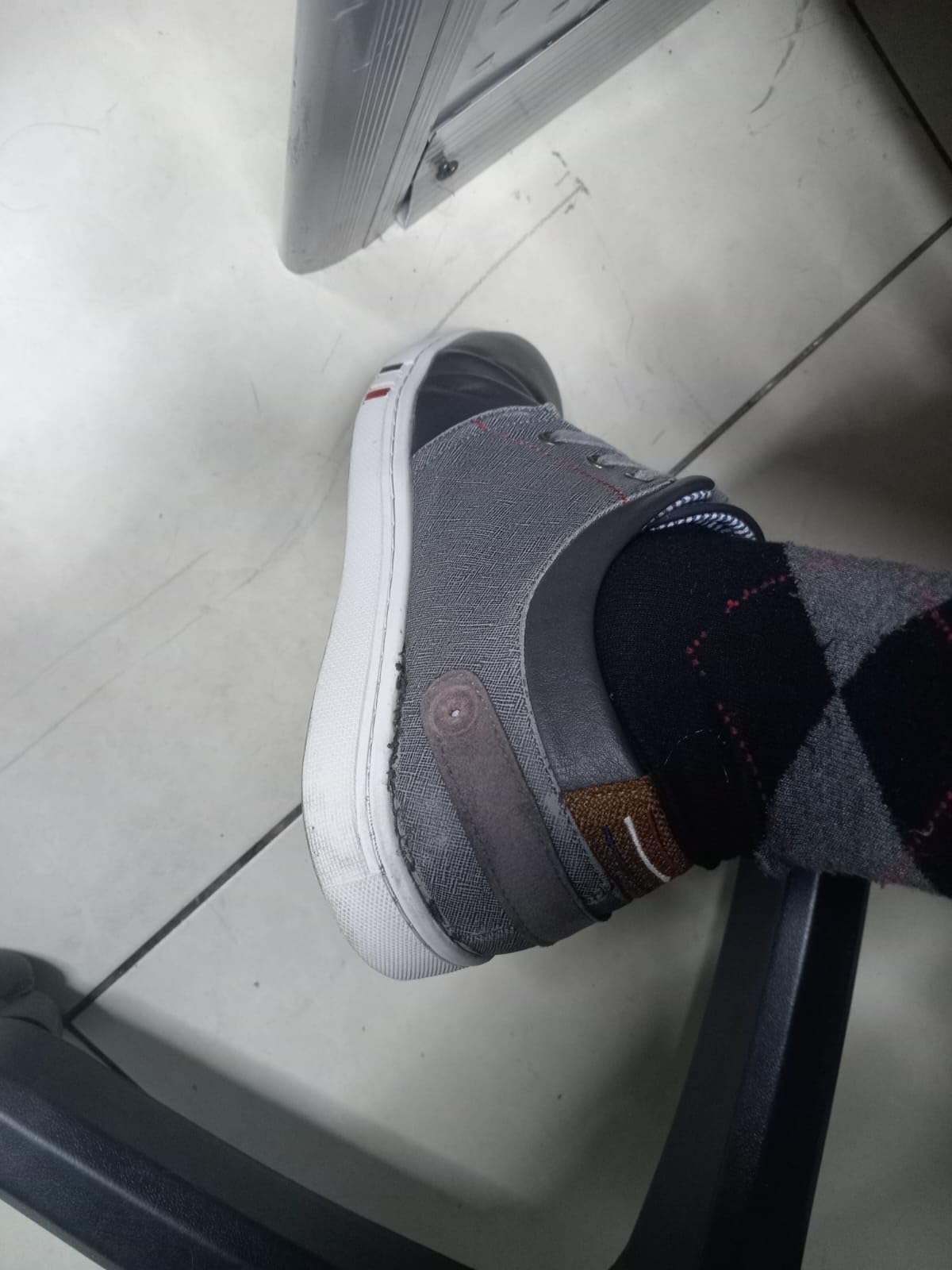 Example of common durability issue showing sole separation on Bruno Marc sneaker