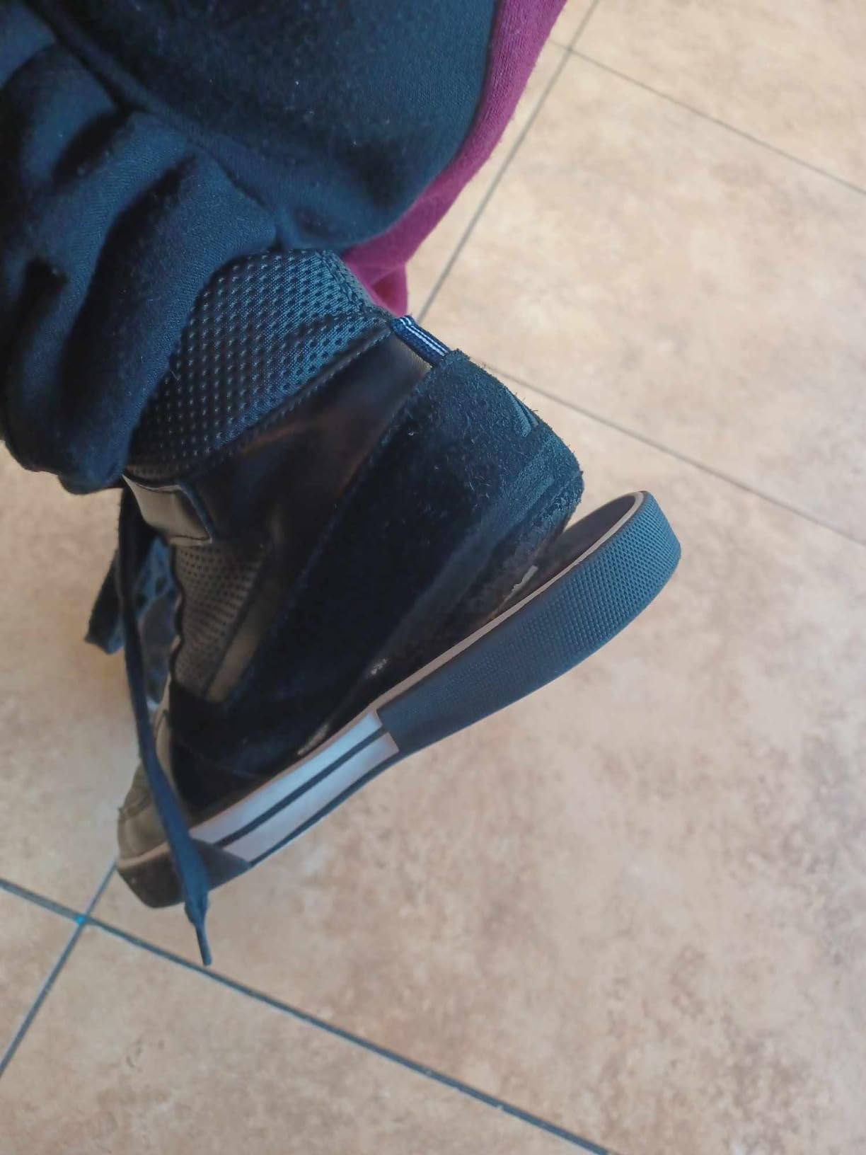 Comparison showing new Nautica Horizon sneaker versus same shoe after weeks of use with sole damage