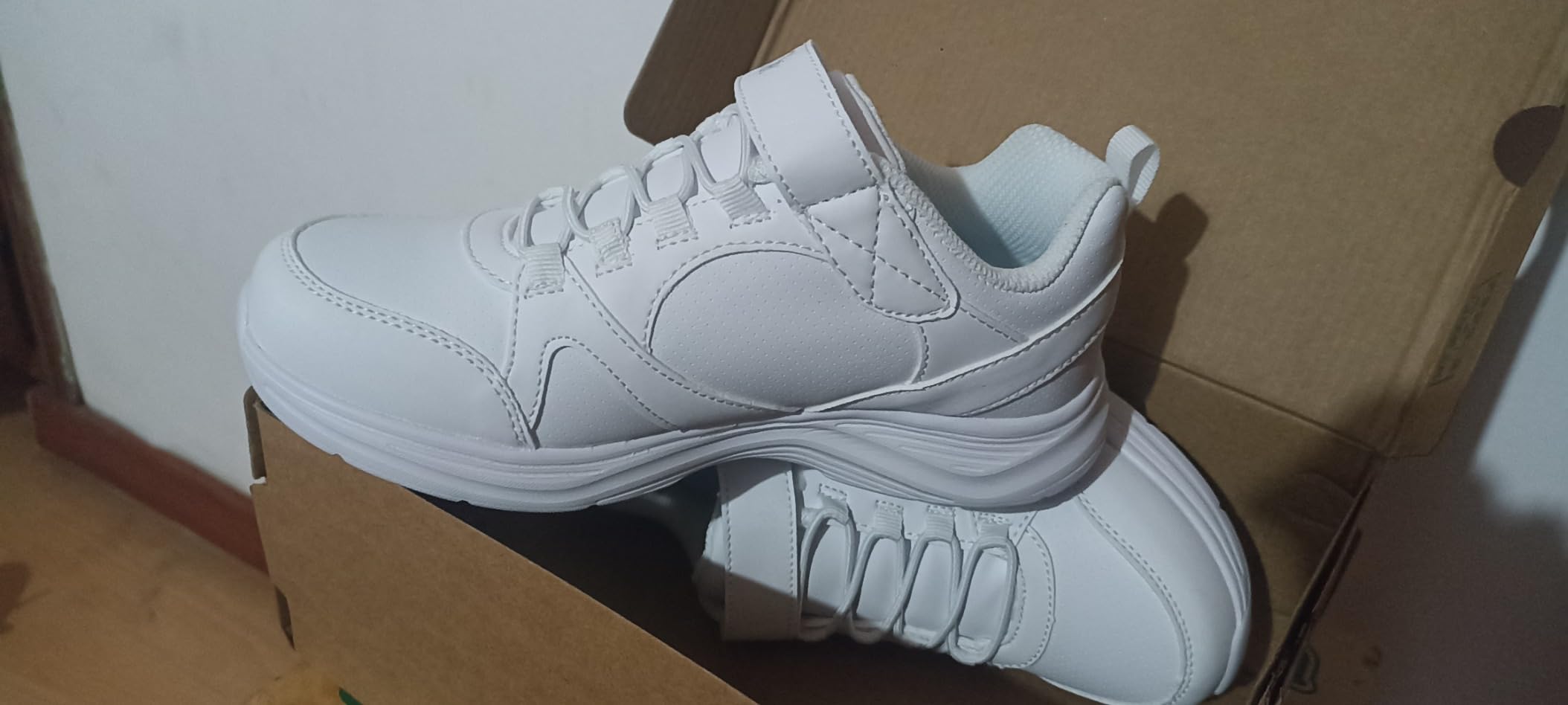Multiple angle view of Skechers Girls Glimmer Kicks demonstrating versatility and school-appropriate styling