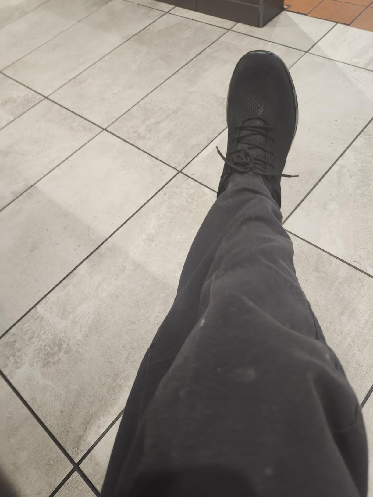 Bottom sole view showing the non-slip tread pattern and rubber construction