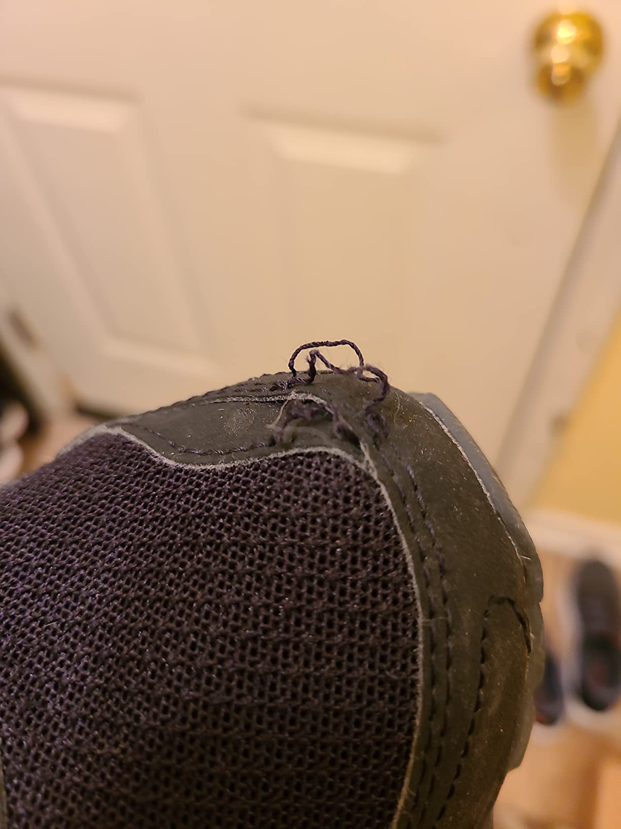 User photo showing upper tear on TR14 after a month