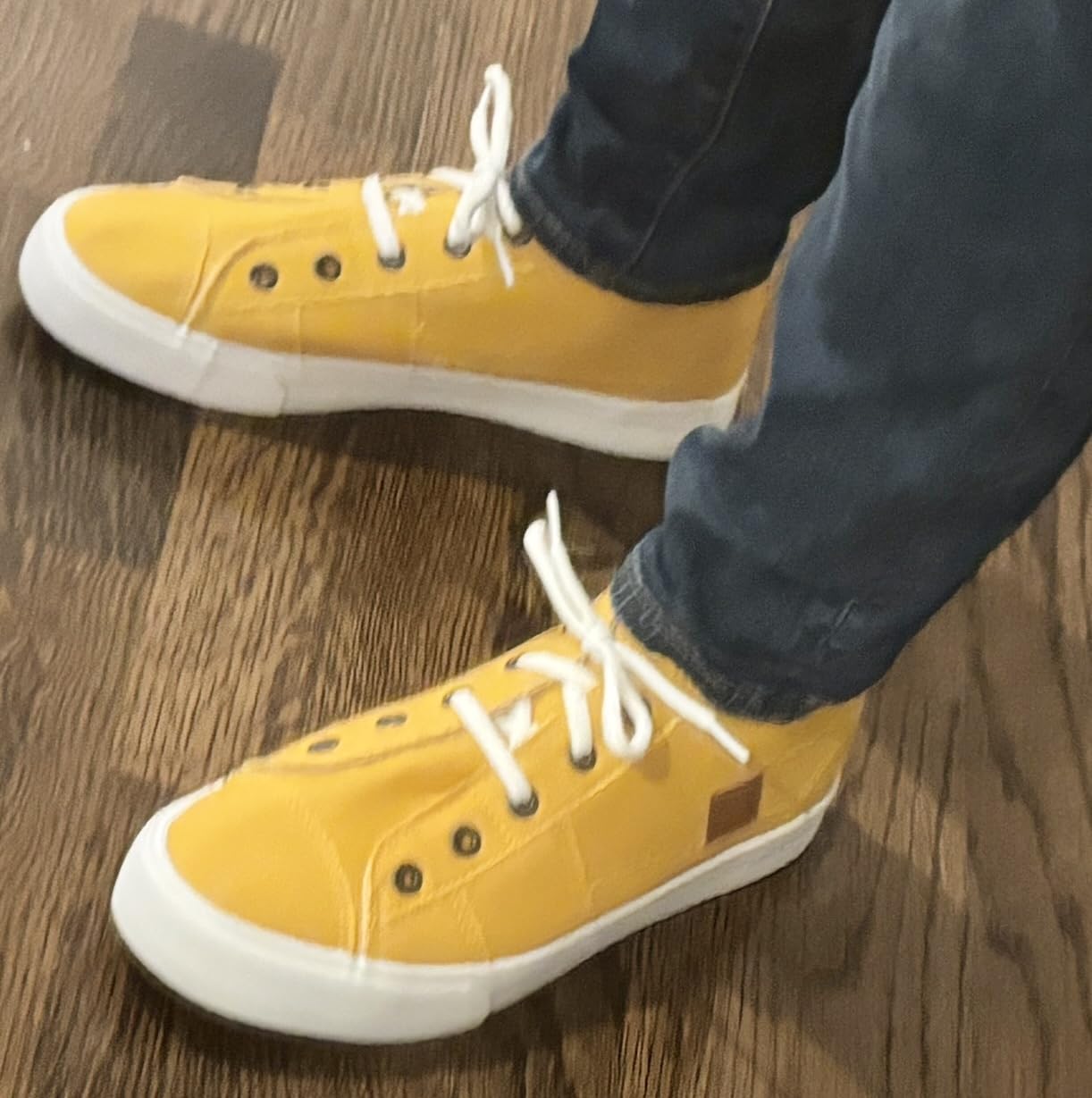 XRH slip-on sneakers demonstrating the dual wear options with both slip-on and laced configurations