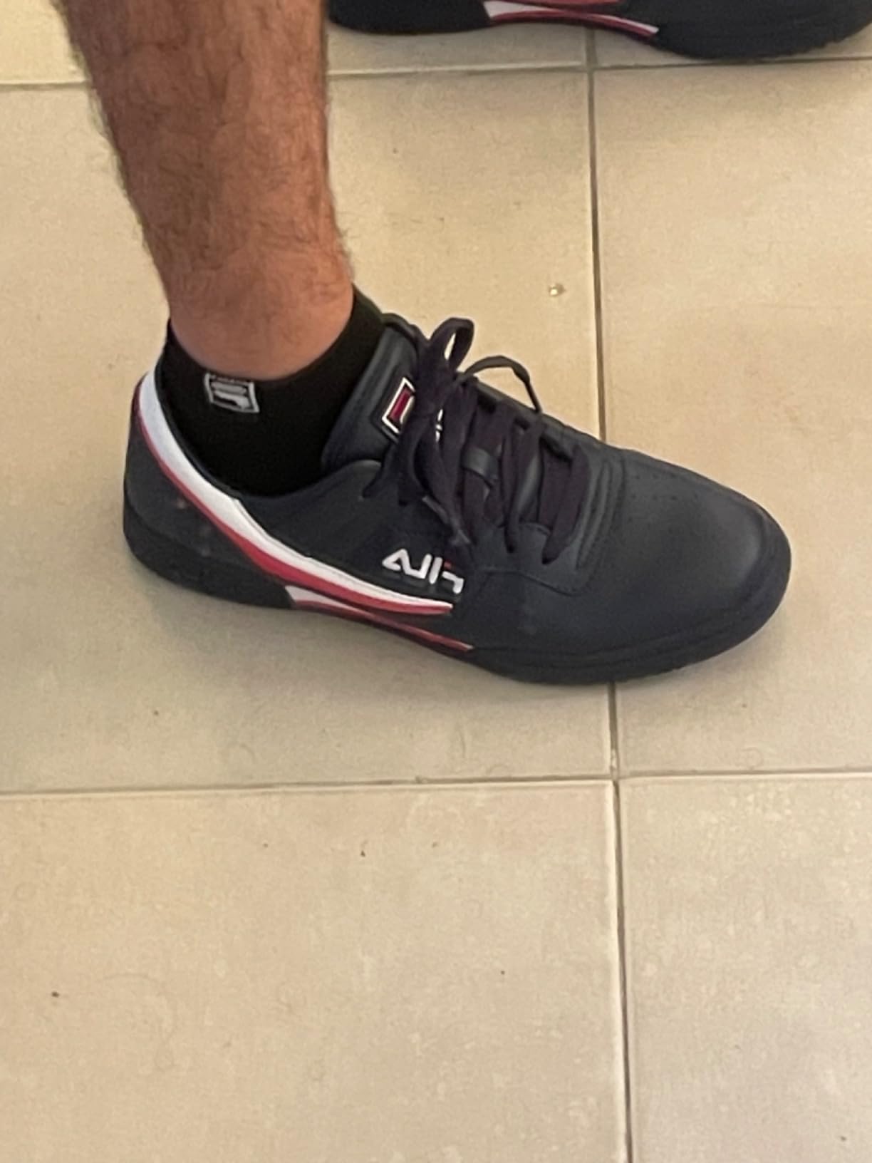 Fila Original Fitness sneaker detail showing classic high-top construction and lacing system