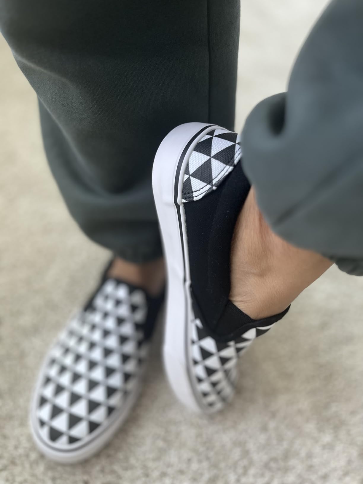 Multiple color options for women's slip-on sneakers including white, black, and various casual shades
